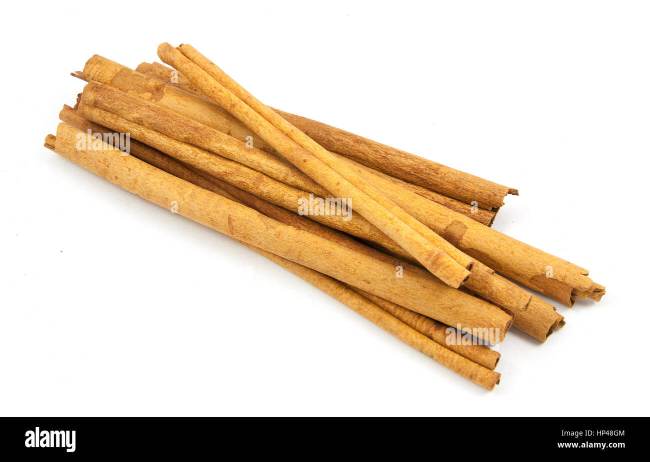 cinnamon ingredients close up isolated on white background Stock Photo