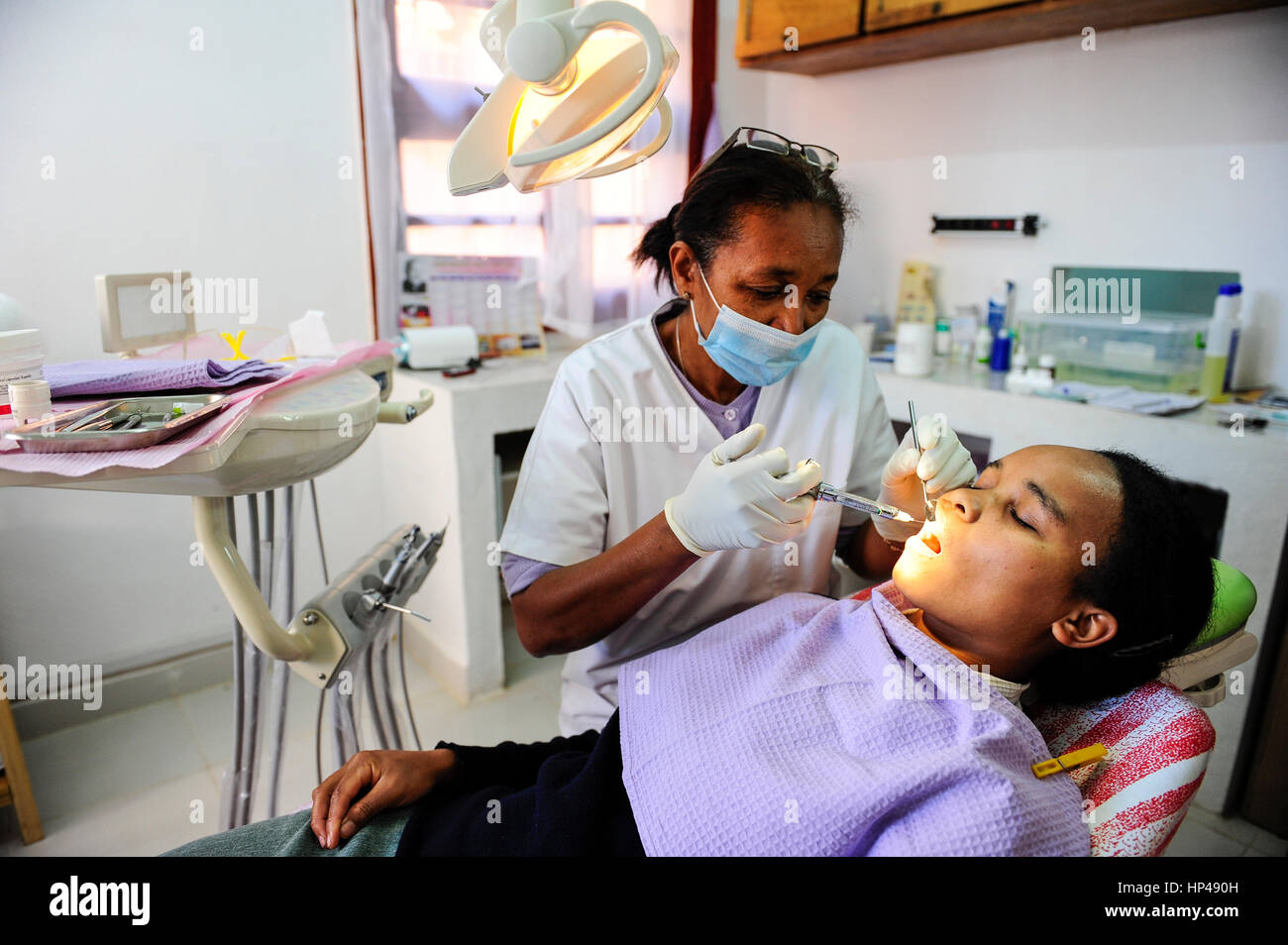 MADAGASCAR Antananarivo , dentist clinic, patient receives Anesthesia syringe Stock Photo