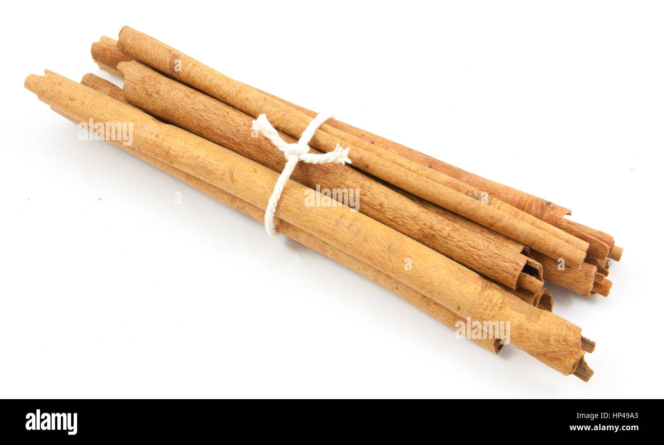 cinnamon ingredients close up isolated on white background Stock Photo