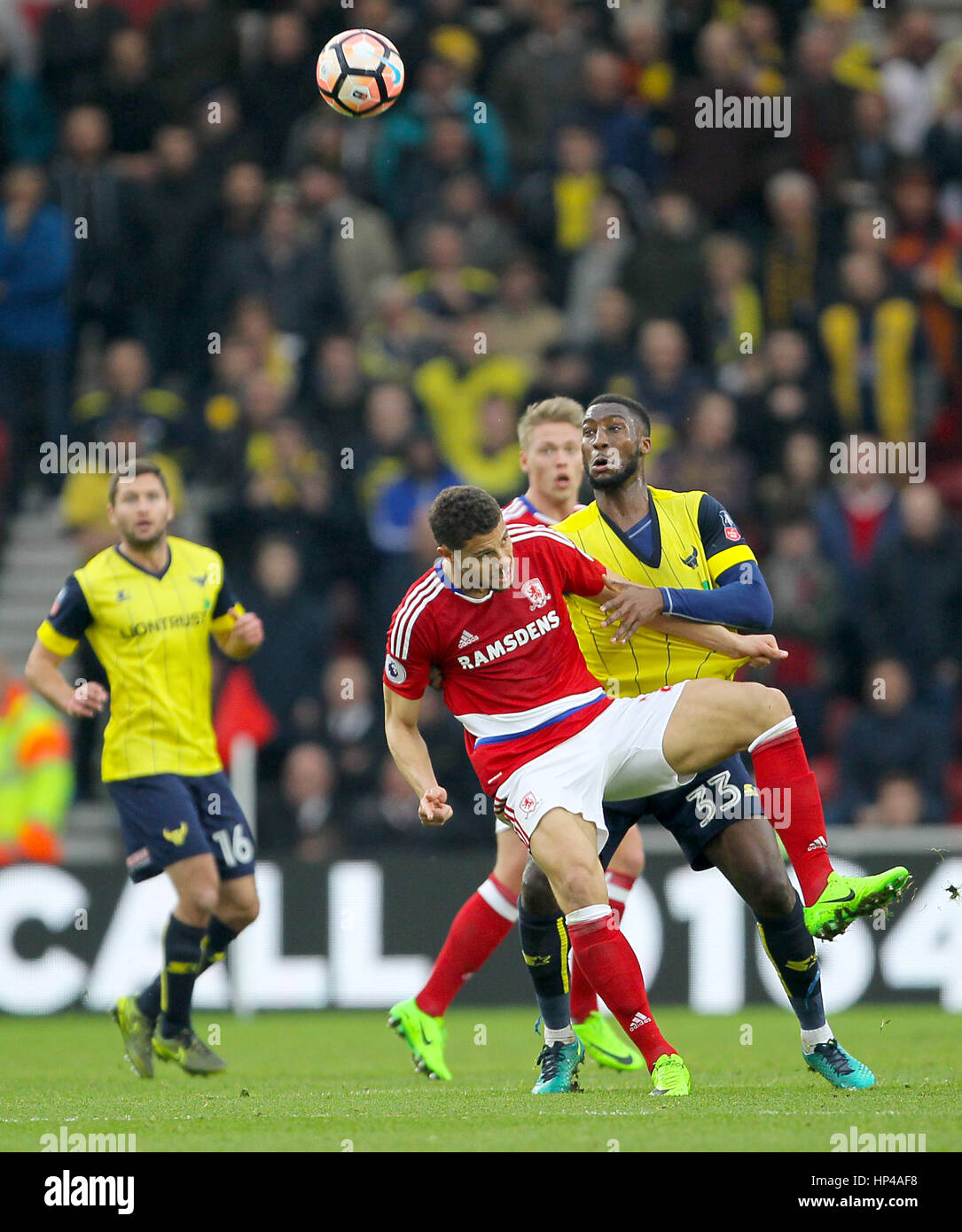 Middlesbrough's Rudy Gestede (left) and Oxford United's Cheyenne Dunkley battle for the ball during the Emirates FA Cup, Fifth Round match at the Riverside Stadium, Middlesbrough. PRESS ASSOCIATION Photo. Picture date: Saturday February 18, 2017. See PA story SOCCER Middlesbrough. Photo credit should read: Richard Sellers/PA Wire. RESTRICTIONS: No use with unauthorised audio, video, data, fixture lists, club/league logos or 'live' services. Online in-match use limited to 75 images, no video emulation. No use in betting, games or single club/league/player publications. Stock Photo