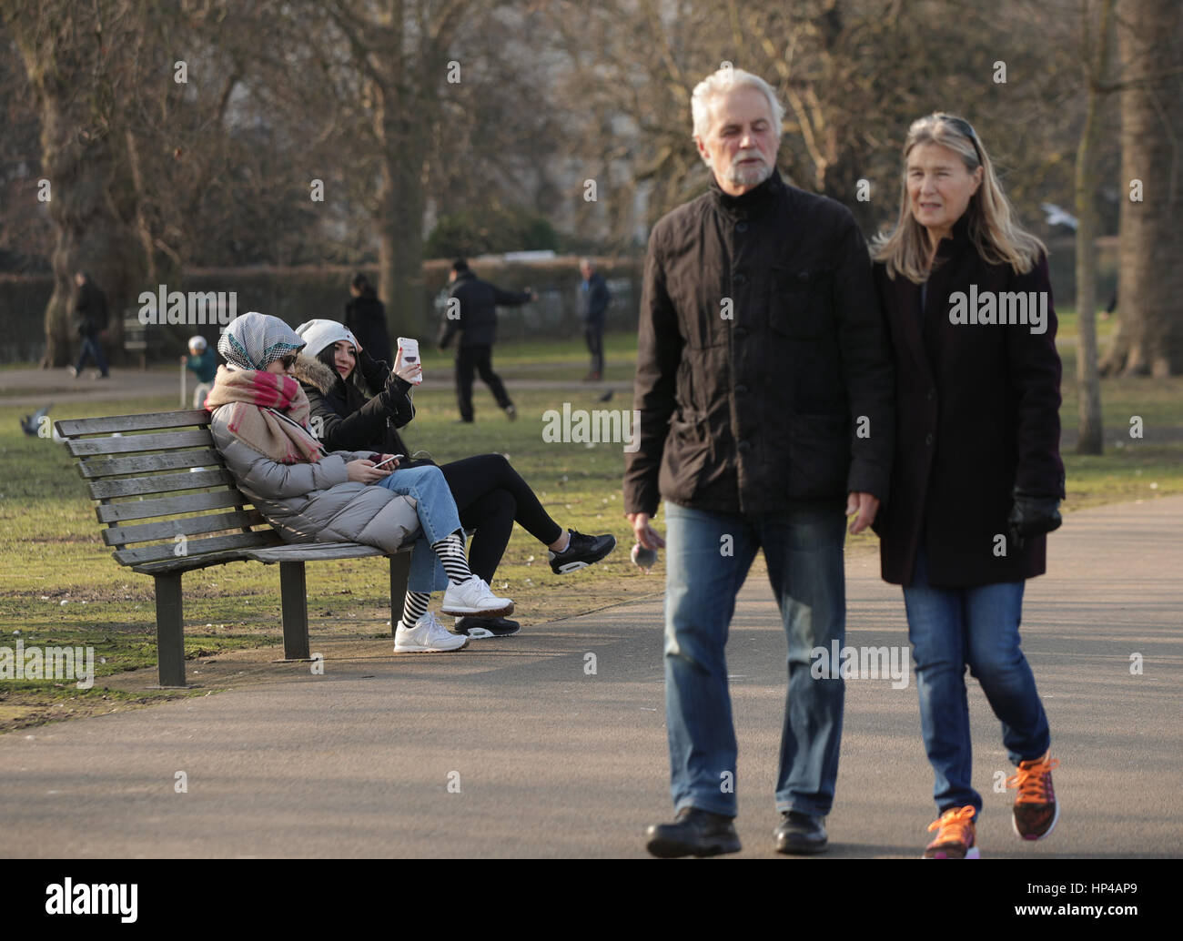 People enjoy a spell of warm weather in Regent's Park, London, as a blast of warm air from the