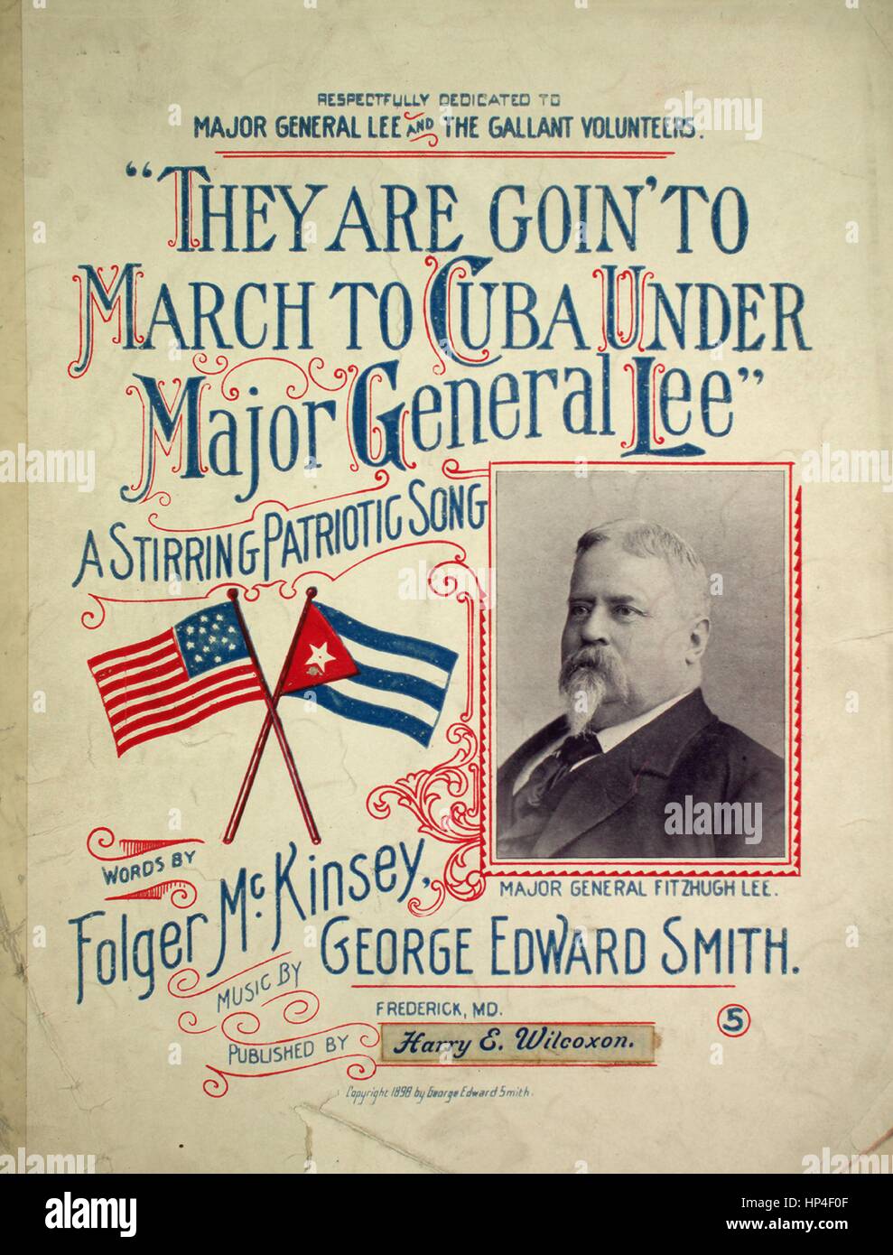 Sheet music cover image of the song 'They are Goin' to March to Cuba Under Major General Lee', with original authorship notes reading 'Words by folger McKinsey Music by George Edward Smith', 1898. The publisher is listed as 'Harry E. Wilcoxon', the form of composition is 'strophic with chorus (missing pages of music)', the instrumentation is 'piano and voice', the first line reads 'Old Virginia's heart is happy, and the Southlands fill'd with glee', and the illustration artist is listed as 'unattributed photo of Major General Fitzhugh Lee'. Stock Photo
