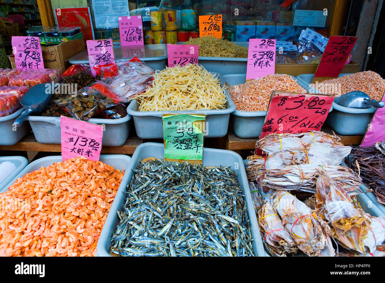 Chinatown. Wing Fat Company. 221 Grand St. grocery. dry or dehydrated fish,New York City, USA Stock Photo