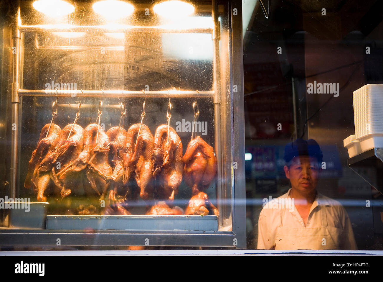 Chinatown.Roasted chickens. Restaurant in Bayard St, as seen from