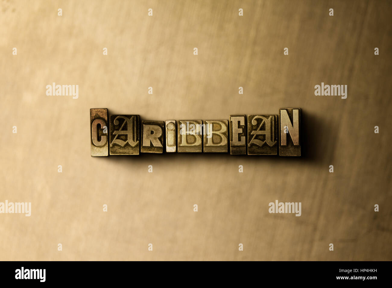CARIBBEAN - close-up of grungy vintage typeset word on metal backdrop ...