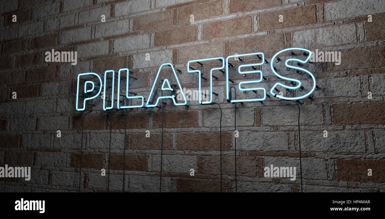 PILATES - Glowing Neon Sign on stonework wall - 3D rendered royalty free stock illustration.  Can be used for online banner ads and direct mailers. Stock Photo