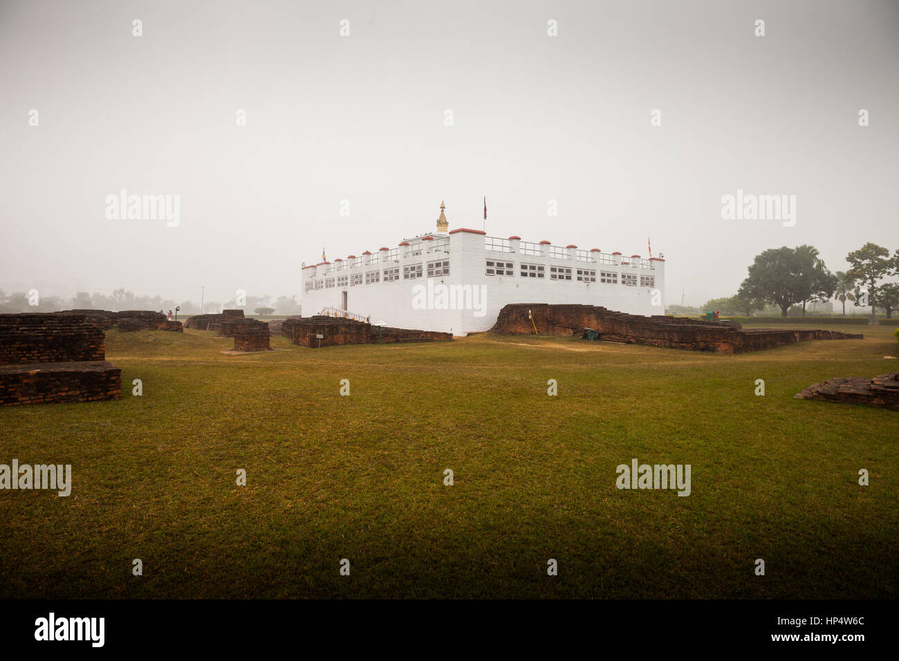 Maya Devi Temple on a foggy day, Lumbini, Nepal. Maya Devi Temple marks the birthplace of Siddharta Gautama, the Buddha Stock Photo