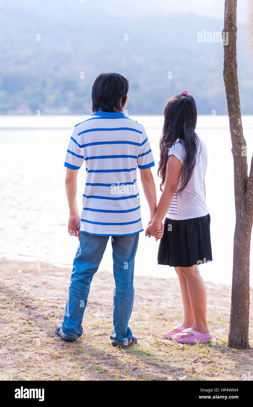 Sweet Cute Couple Relaxing in Park Stock Photo - Alamy