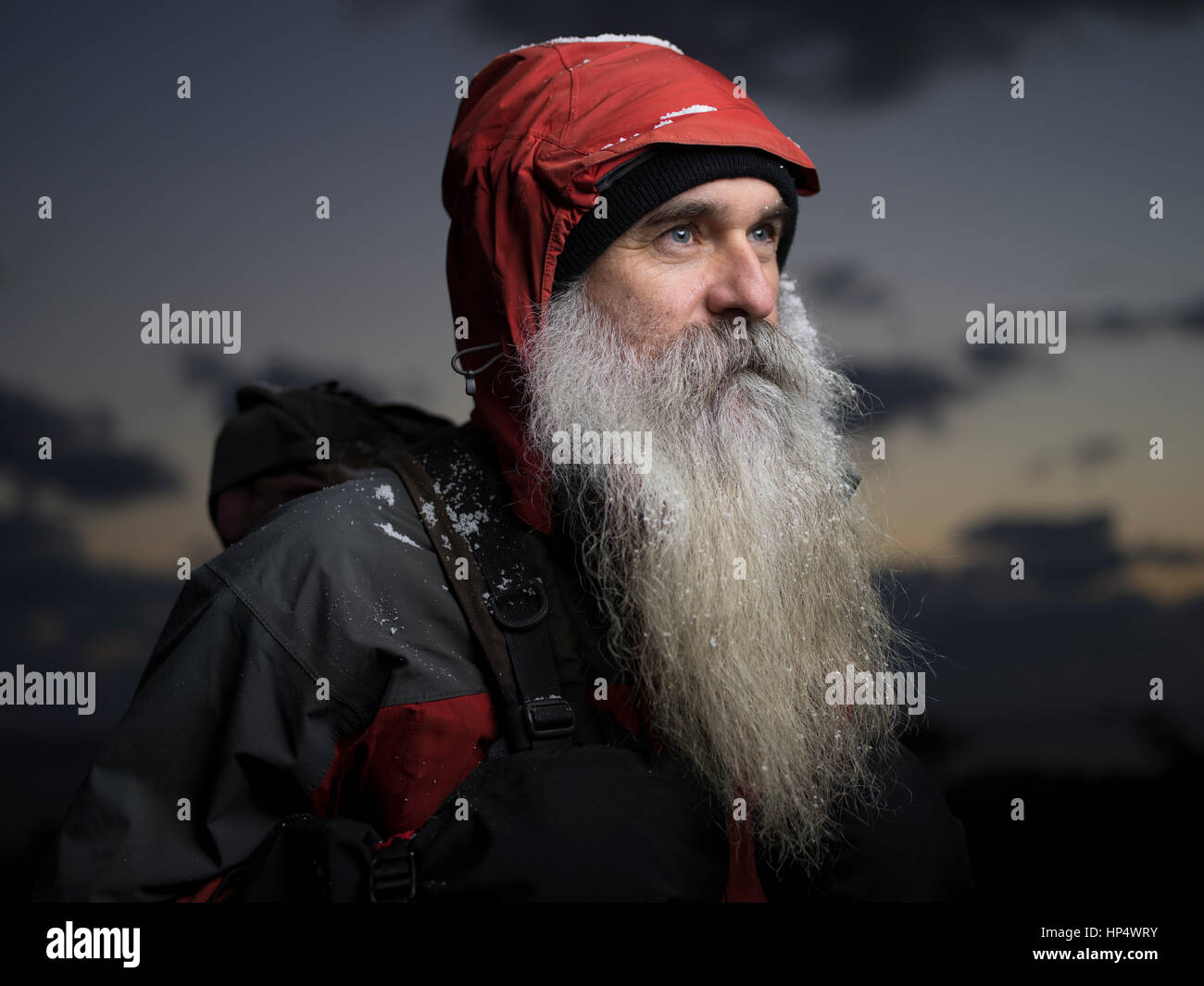 Mountaineer with beard and jacket Stock Photo
