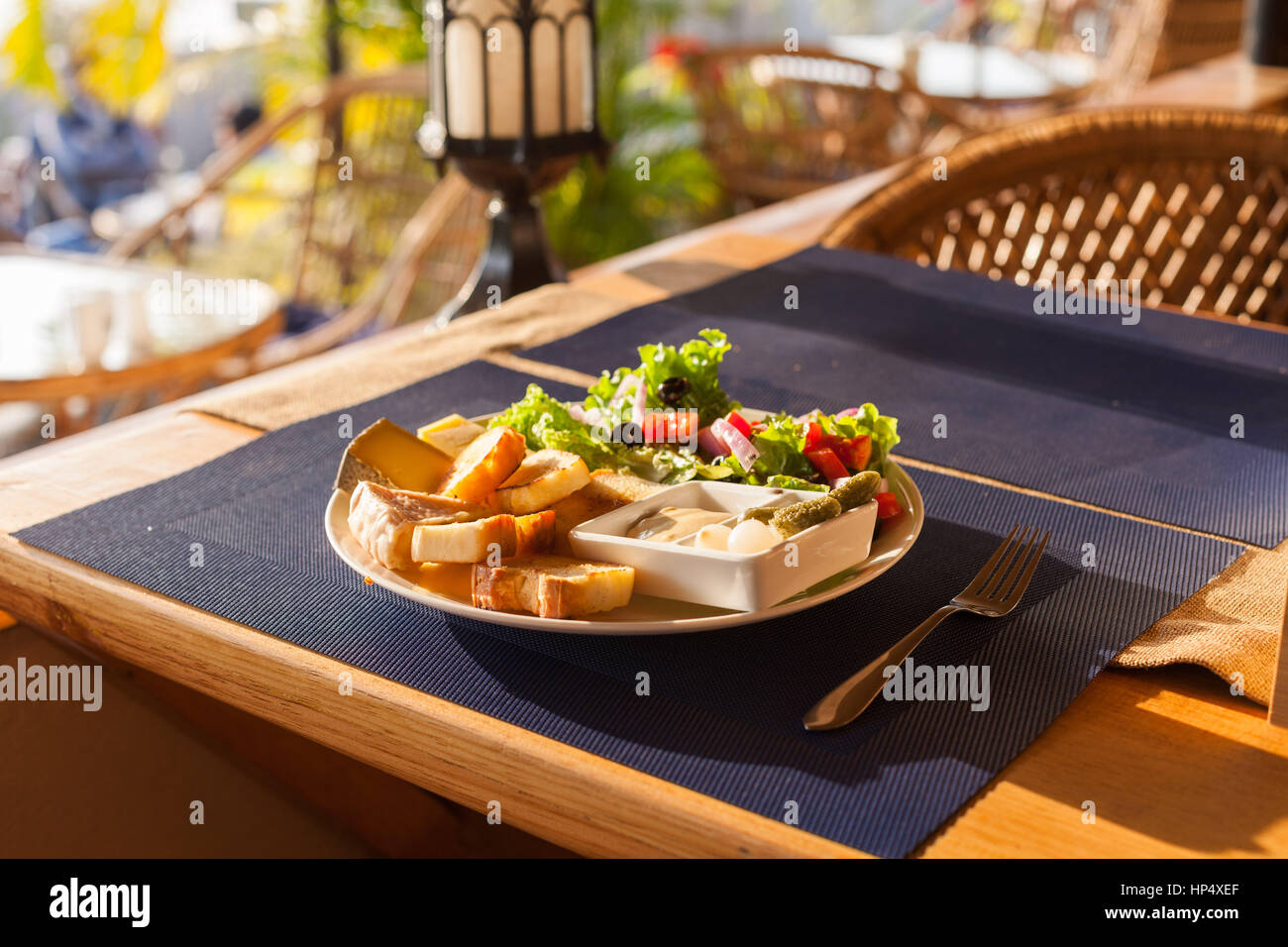 A French chesse plate with Tomme, Belkot, and Saint Marcellin cheeses