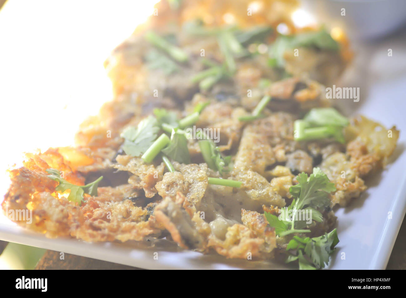 oysters fried in egg batter or fried oyster dish (Thai food Stock Photo Alamy