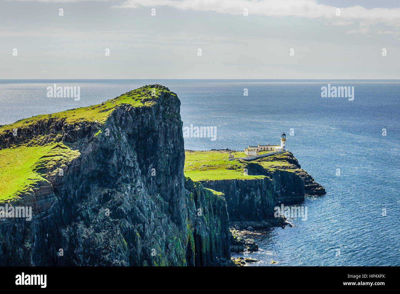 View on Niest Point with a lighthouse on the Isle of Skye Stock Photo