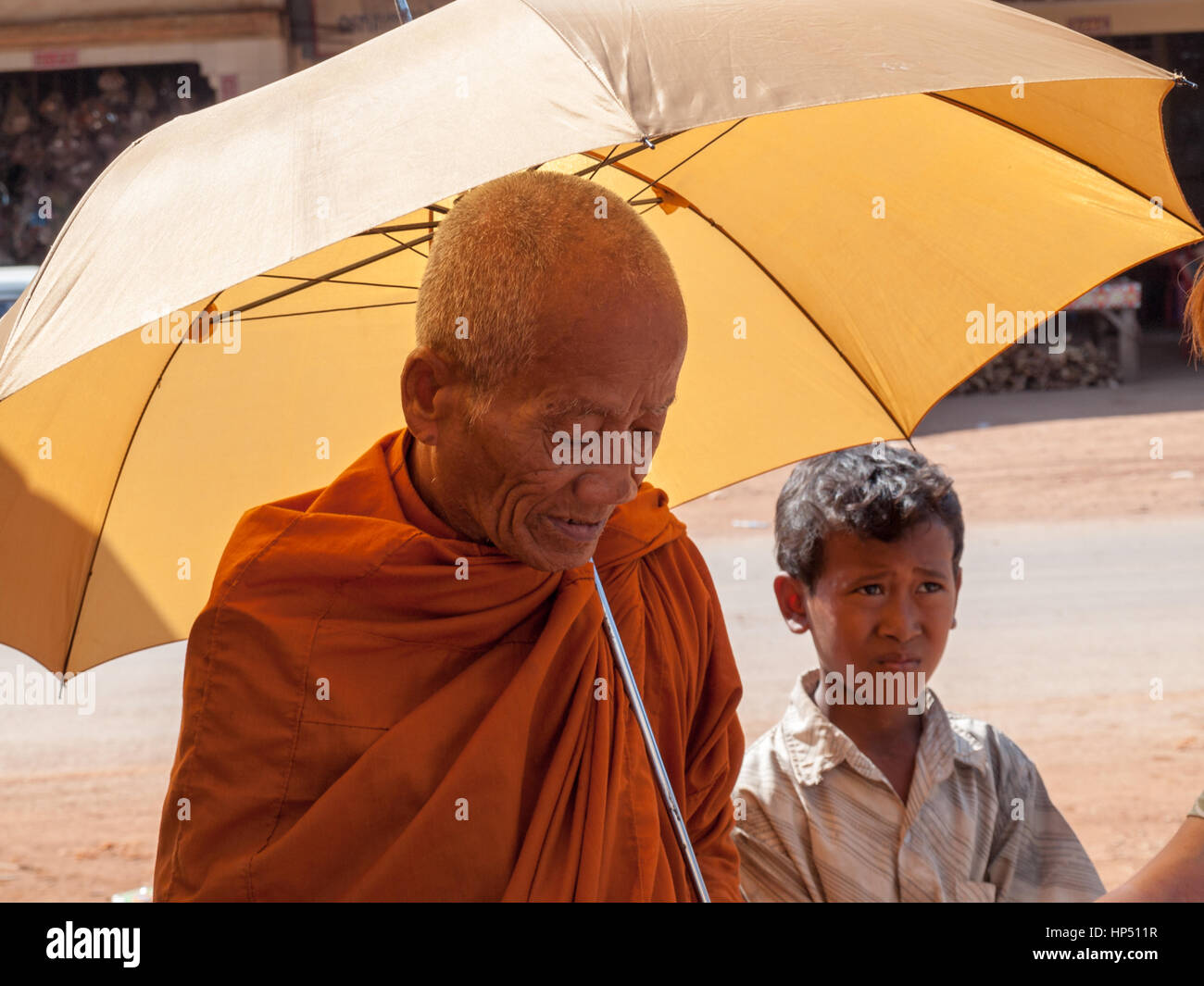 Cambodian monk and boy Stock Photo