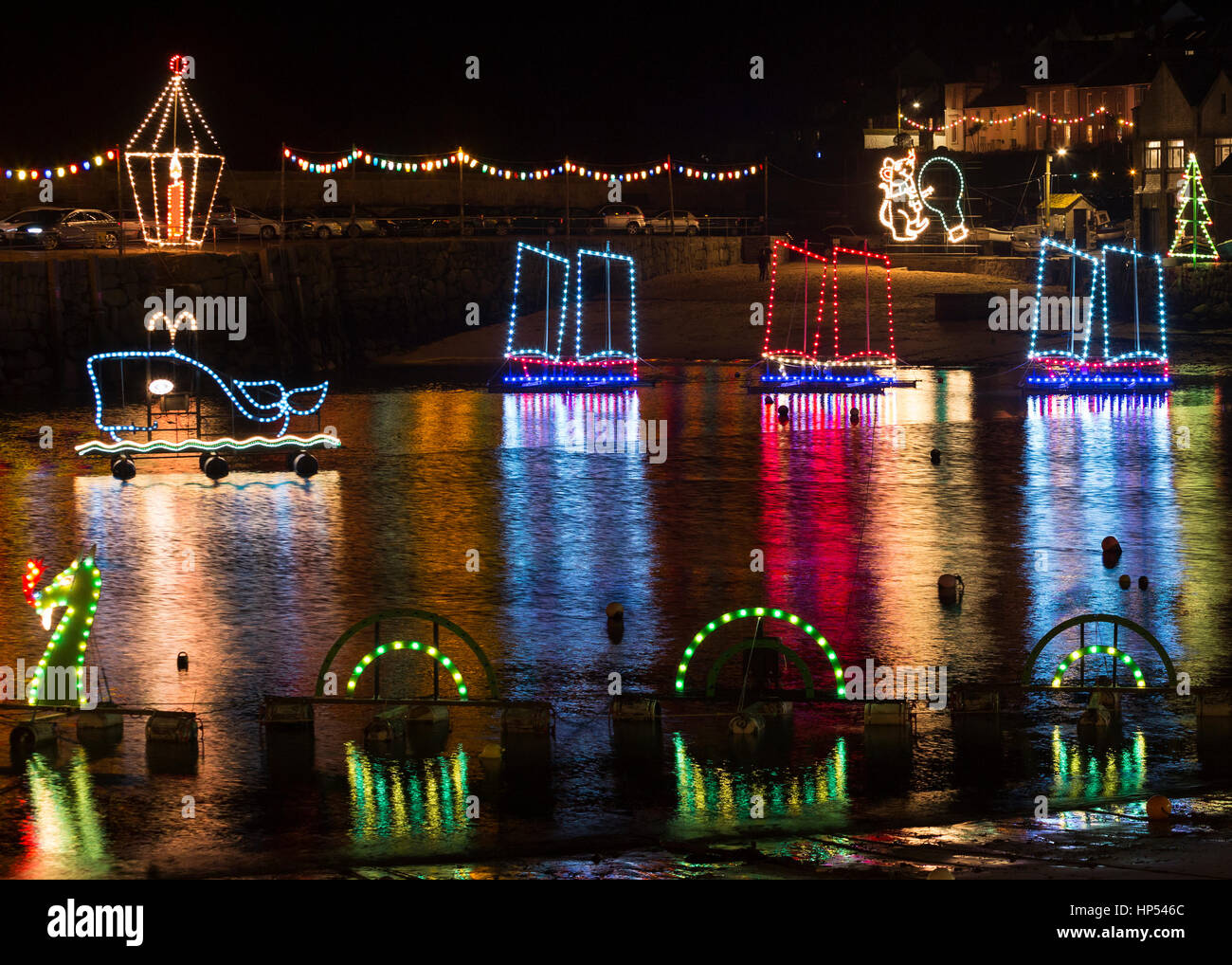 Colourful Christmas lights, Mousehole Harbour, Cornwall, England, UK