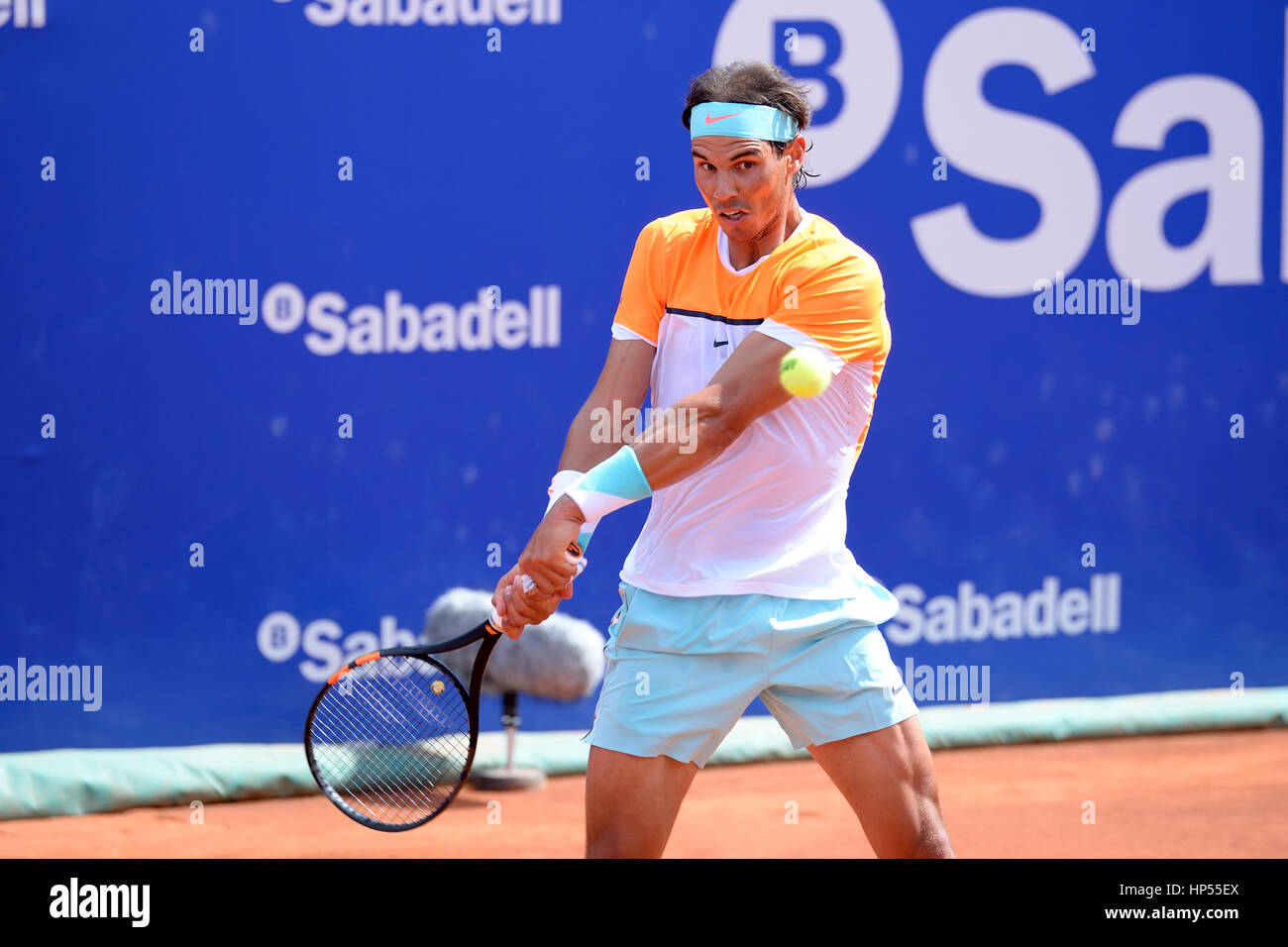 BARCELONA - APR 22: Rafa Nadal (Spanish tennis player) plays at the ATP Barcelona Open Banc Sabadell Conde de Godo tournament. Stock Photo