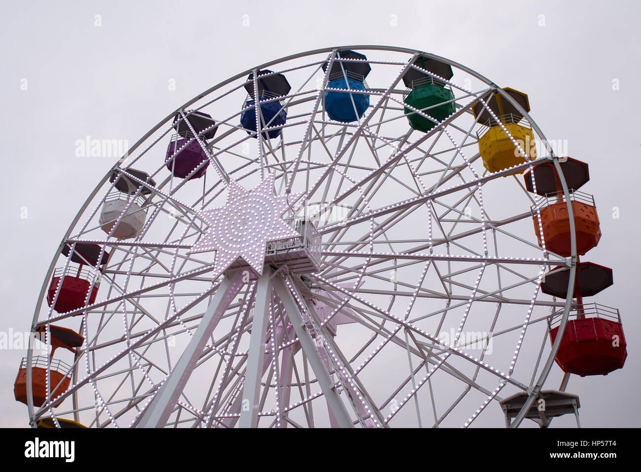 A ferris wheel in a foggy day Stock Photo - Alamy
