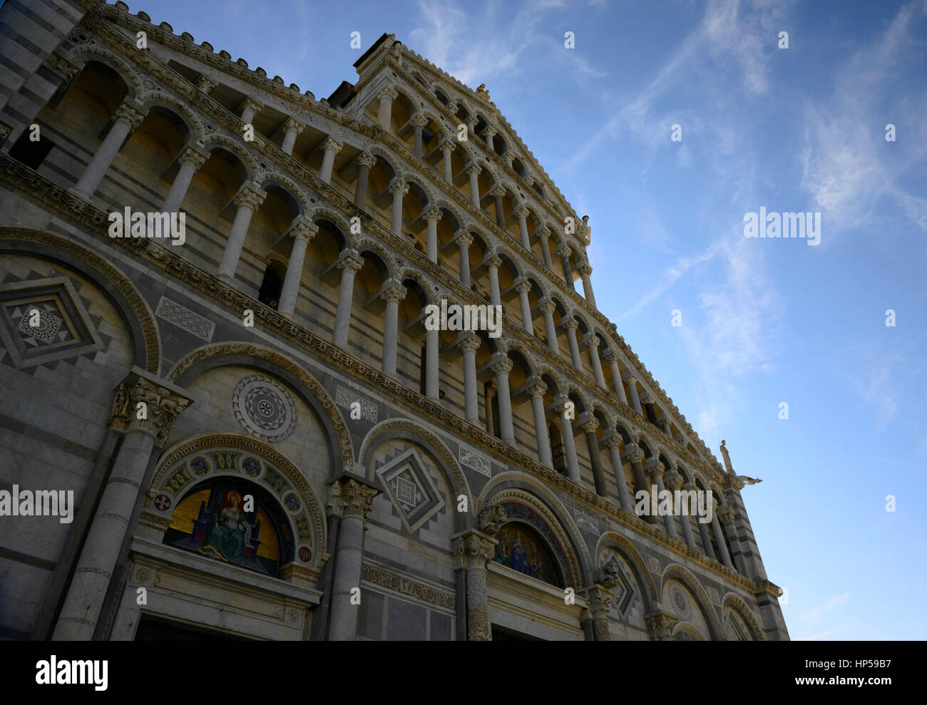 The Baptistery, Duomo, medieval cathedral, Archdiocese of Pisa, Santa Maria Assunta, St Mary of the Assumption.cathedral, aisles, nave, transept, chur Stock Photo