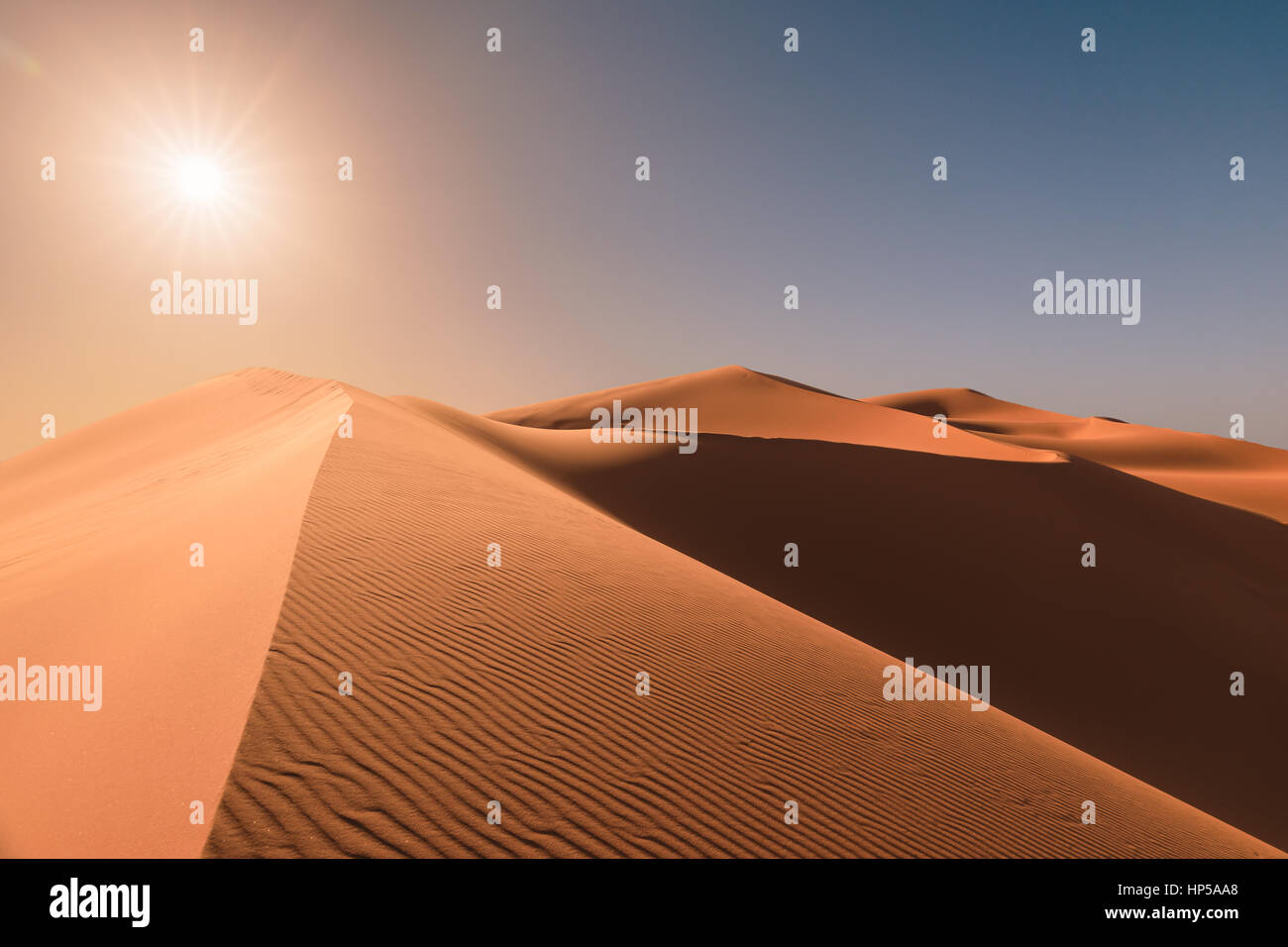 Sunrise over dunes of Erg Chebbi, Sahara, Merzouga, Morocco Stock Photo
