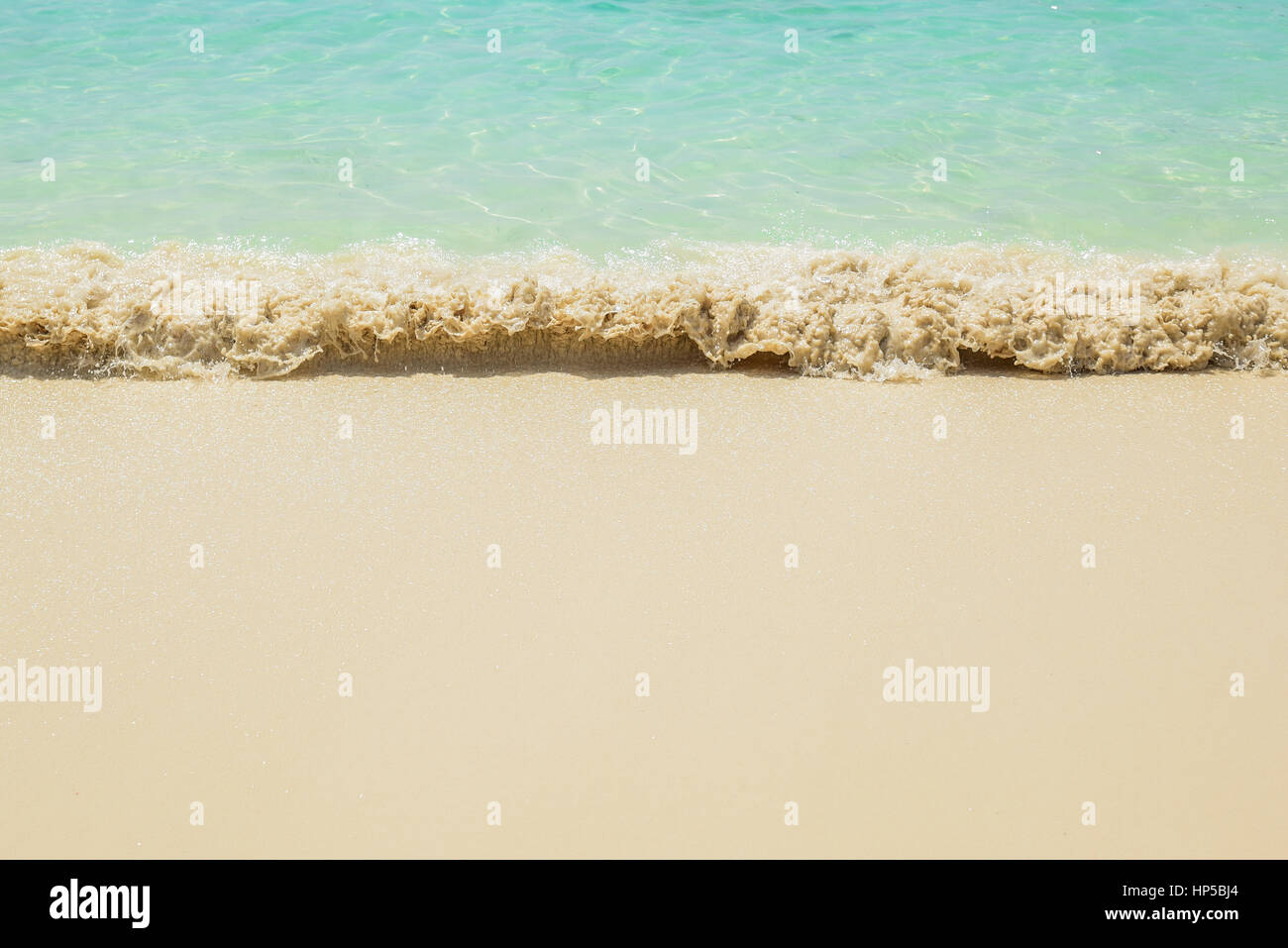 Waves breaking on sandy hi-res stock photography and images - Alamy