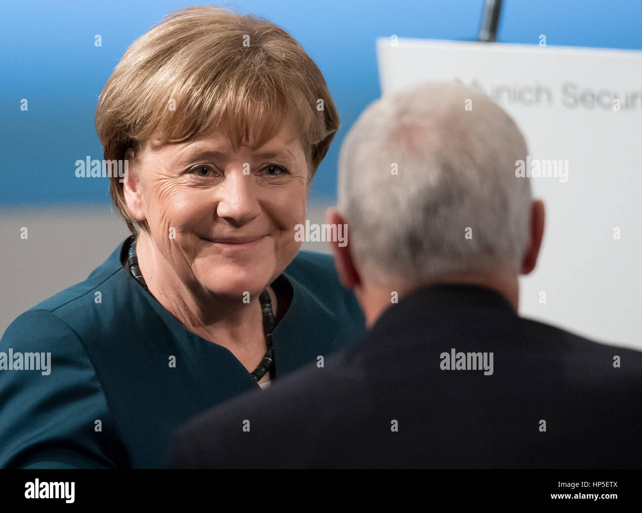 Munich, Germany. 18th Feb, 2017. German Chancellor Angela Merkel greets US Vice President Mike Pence at the security conference in Munich, Germany, 18 February 2017. The Munich Security Conference will take place between the 17th and the 19th of February 2017. Photo: Sven Hoppe/dpa/Alamy Live News Stock Photo