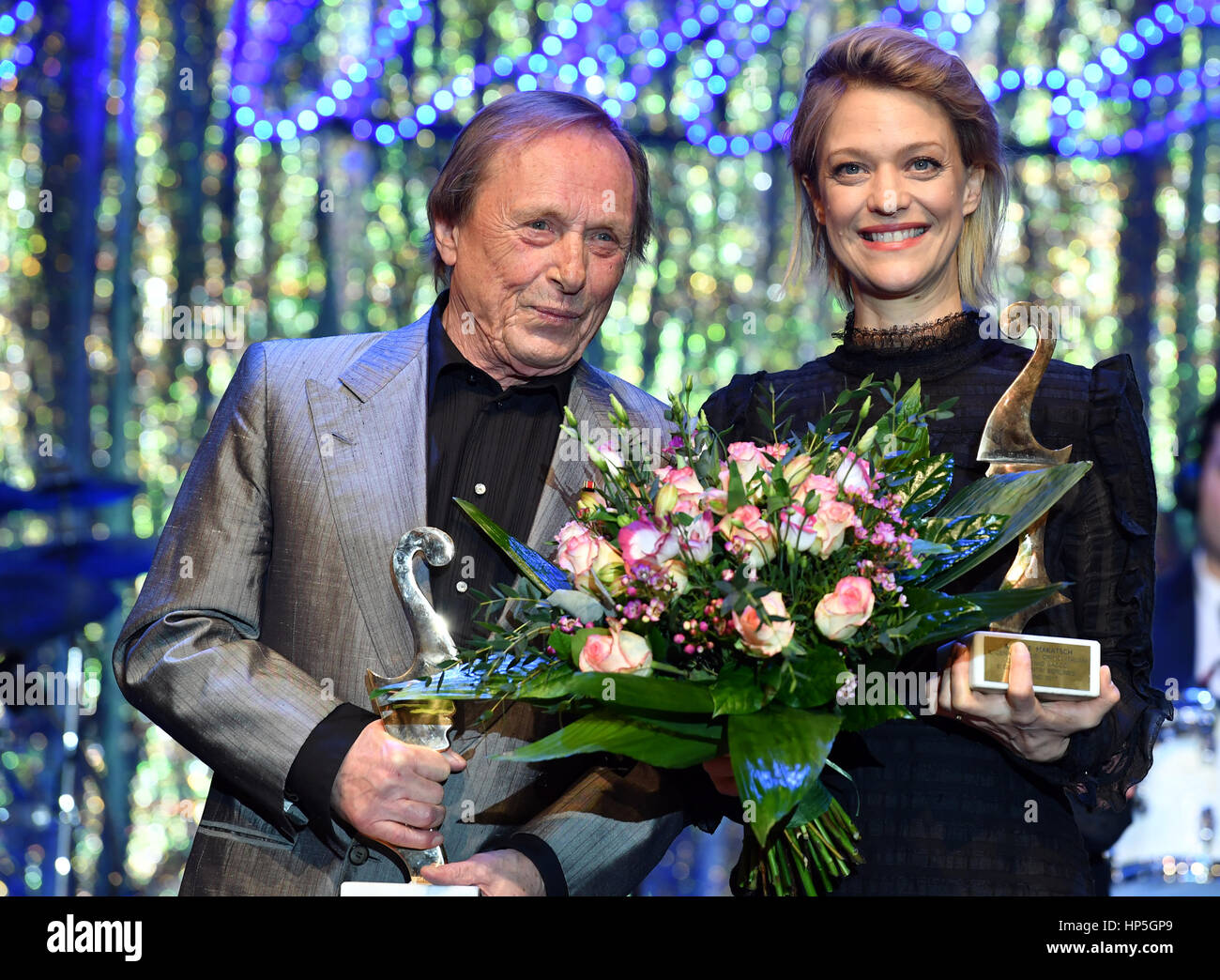 Berlin, Germany. 17th Feb, 2017. German actors Claus Theo Gaertner (L) and Heike Makatsch pose with their awards at the Italian film ball 'Notte delle Stelle' held during the 67th International Berlin Film Festival, also known as Berlinale, in Berlin, Germany, 17 February 2017. The Premio Bacco awards are presented during the annual film ball. Photo: Jens Kalaene/dpa-Zentralbild/dpa/Alamy Live News Stock Photo