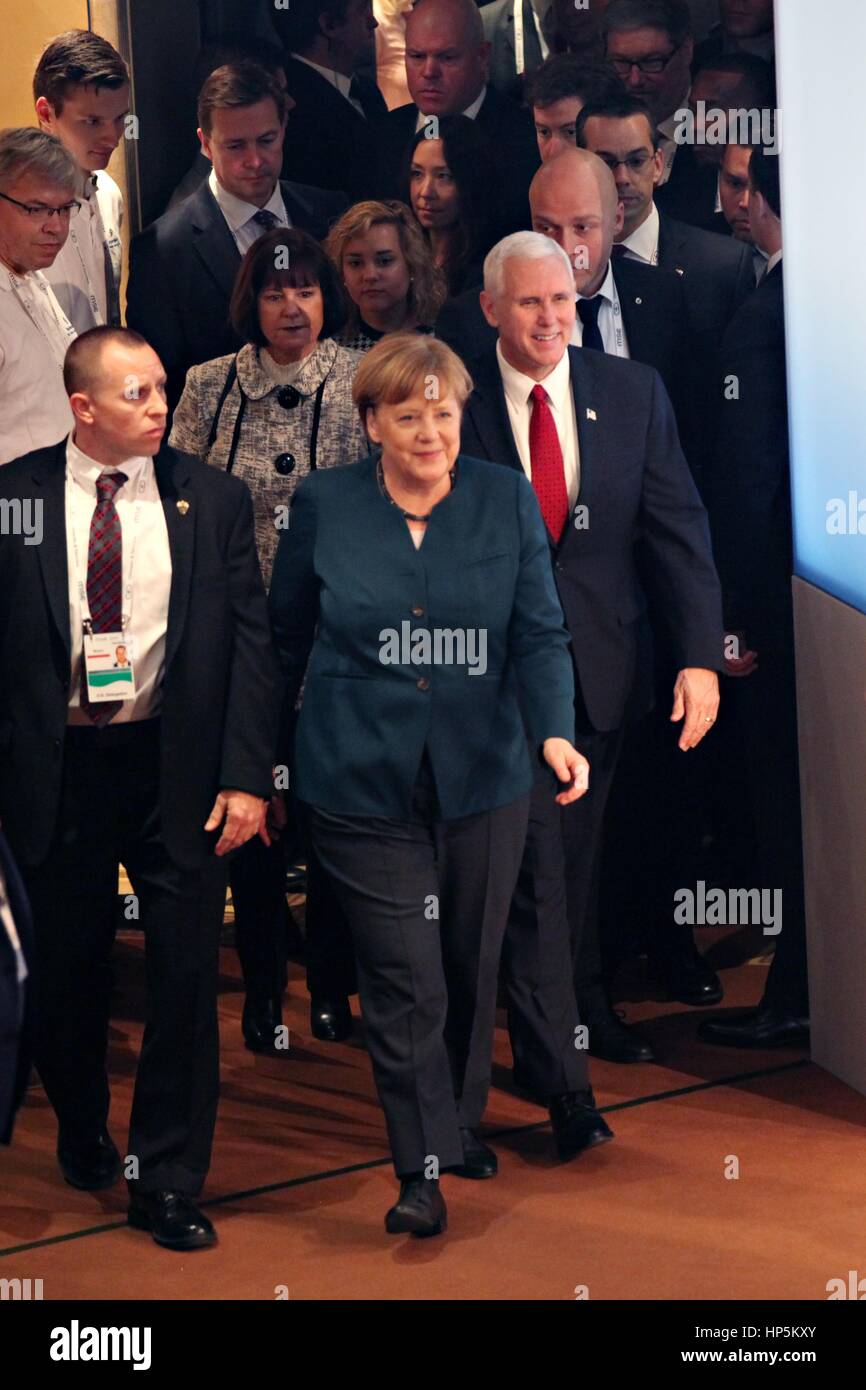 Munich, Germany. 18th Feb, 2017. German Chancellor Angela Merkel escorts U.S. Vice President Mike Pence to the Munich Security Conference February 18, 2017 in Munich, Germany. Pence later told the European allies that 'the United States of America strongly supports NATO and will be unwavering in our commitment to this trans-Atlantic alliance.' Credit: Planetpix/Alamy Live News Stock Photo