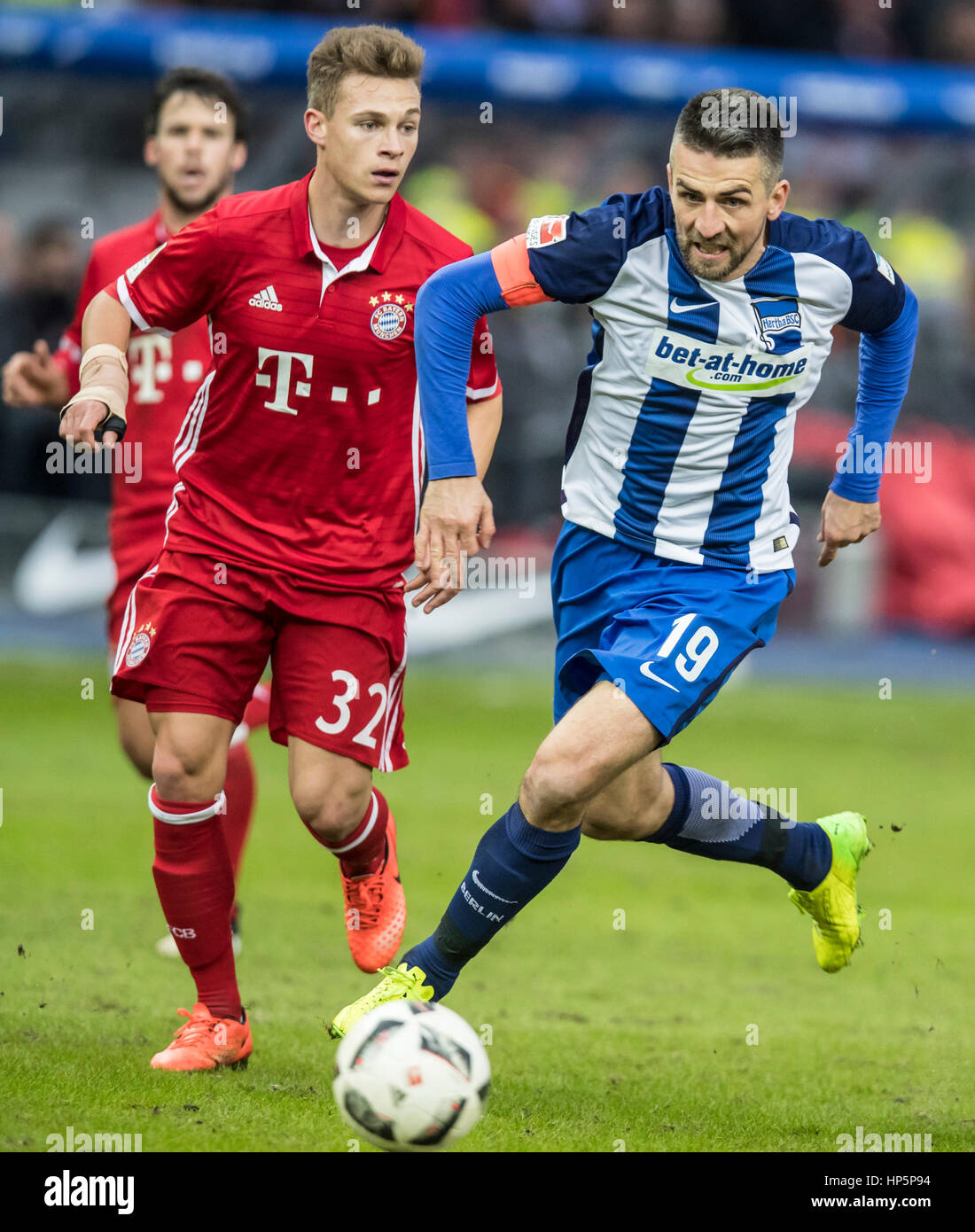 Berlin, Germany. 18 th February, 2017.  Joshua KIMMICH, FCB 32  compete for the ball against  Vedad IBISEVIC, Hertha 19  in the 1. German Soccer League match HERTHA BSC BERLIN - FC BAYERN MUNICH  in Berlin,, February 18, 2017   © Peter Schatz / Alamy Live News Stock Photo