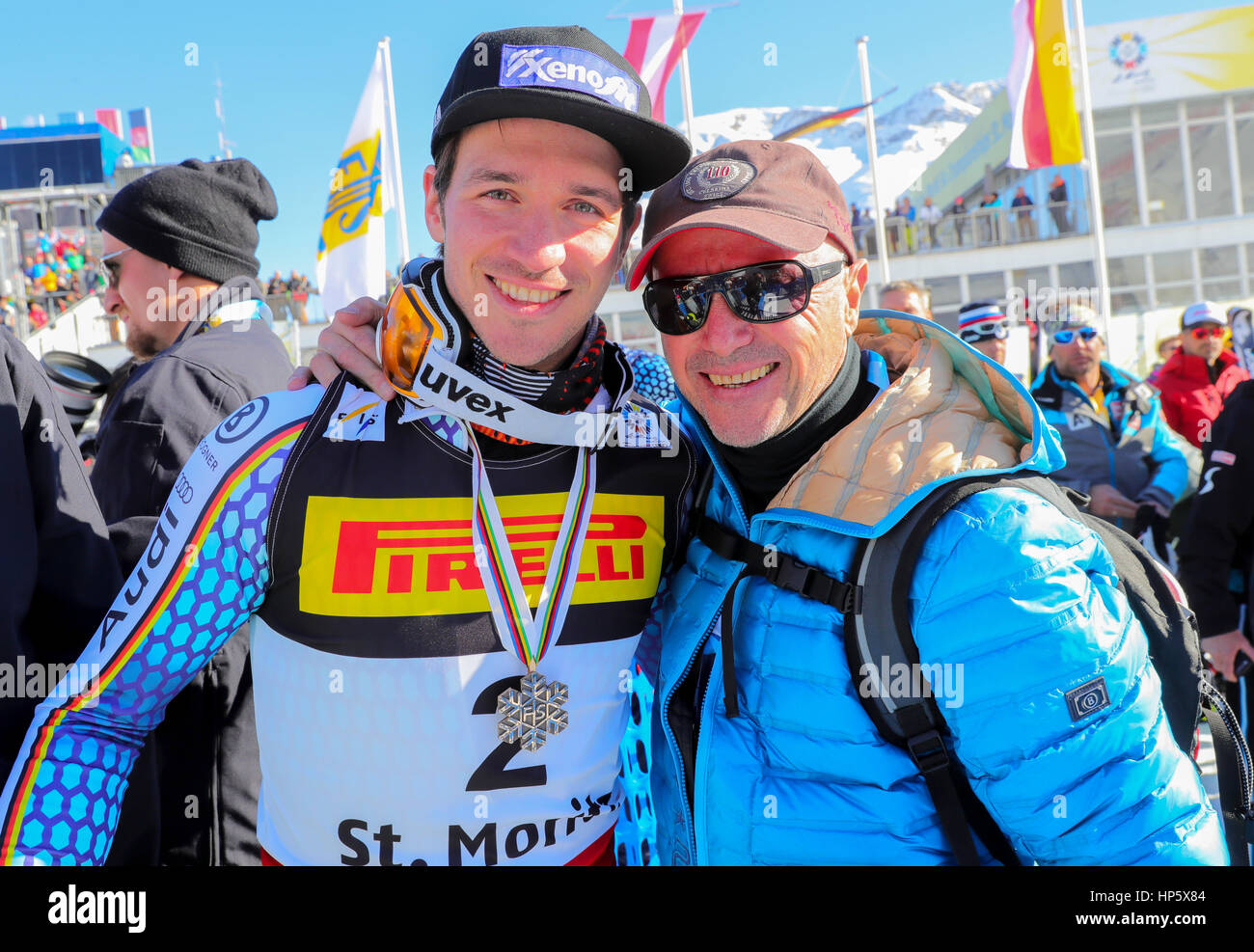 Felix Neuruther from Germany and his father, former professional skier Christian Neureuther, celebrate after the 2nd round of the men's slalom at the Alpine Skiing World Championship in St. Moritz, Switzerland, 19 February 2017. Photo: Michael Kappeler/dpa Stock Photo