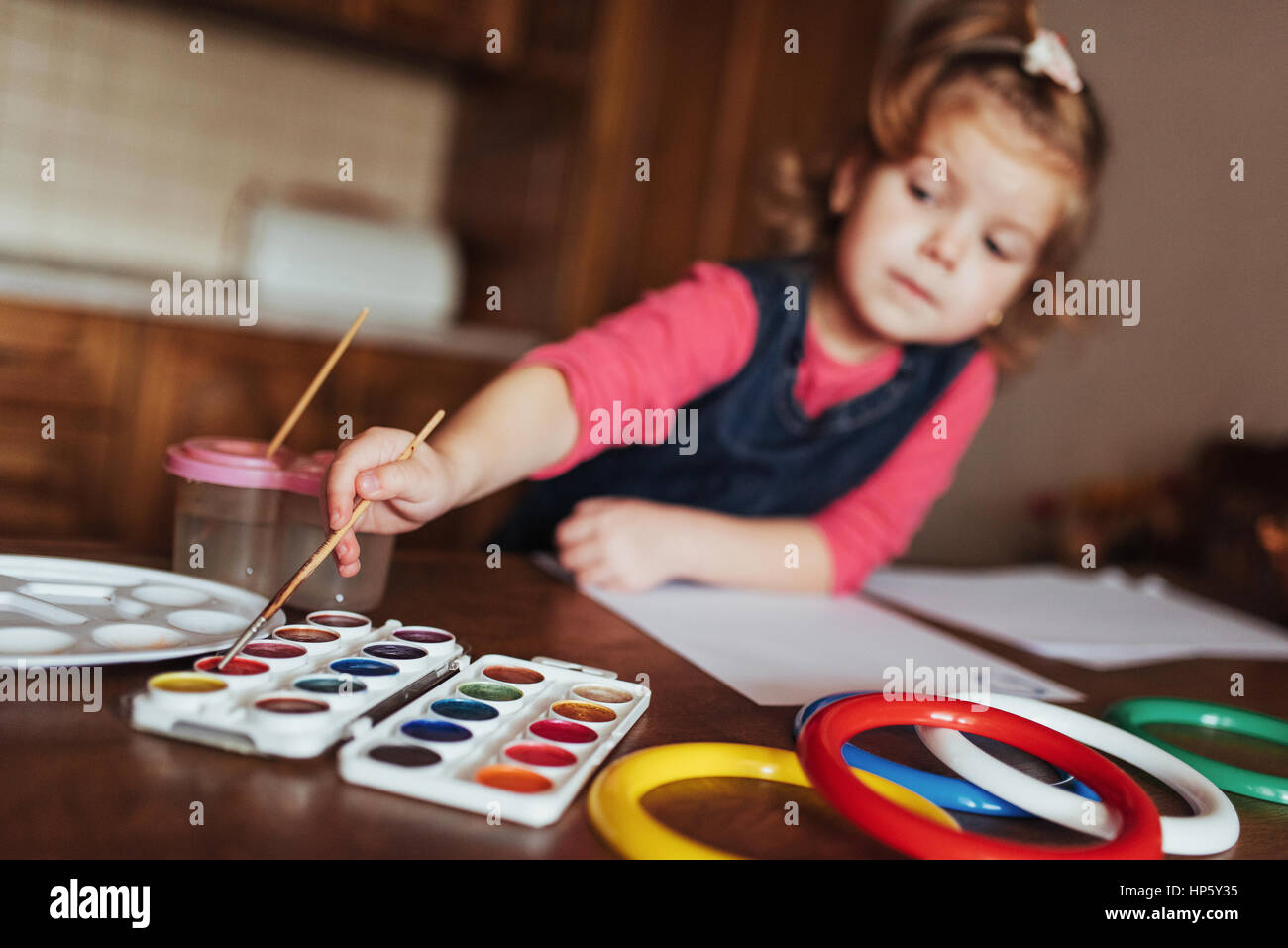 Cute little girl, adorable preschooler painting with watercolors Stock ...