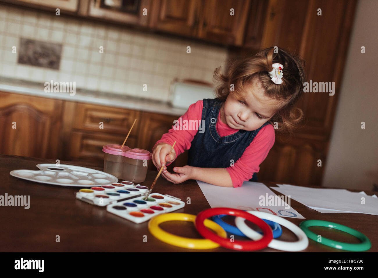 Cute little girl, adorable preschooler painting with watercolors Stock ...