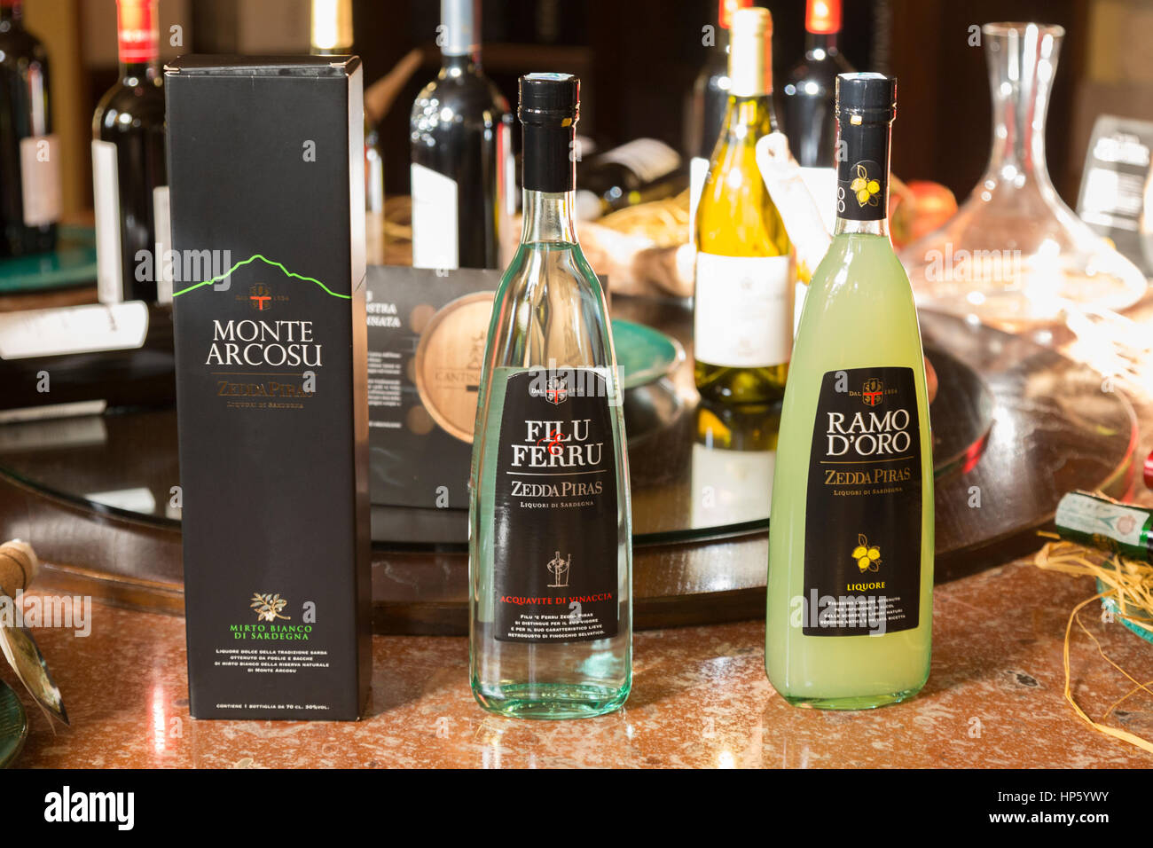 Mirto, grappa and limoncello, typycal sardinian liqueurs on sale in Sella & Mosca's wine shop, Alghero, Sassari, Sardinia Italy Stock Photo