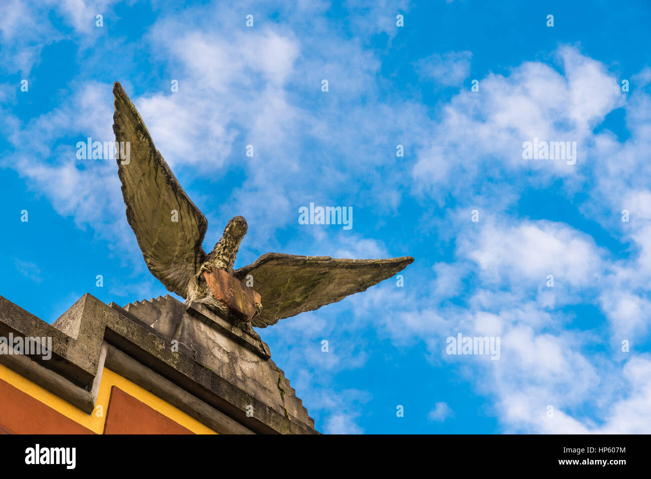 Eagle of stone. Concept and symbol of force, freedom, control and power. Stock Photo