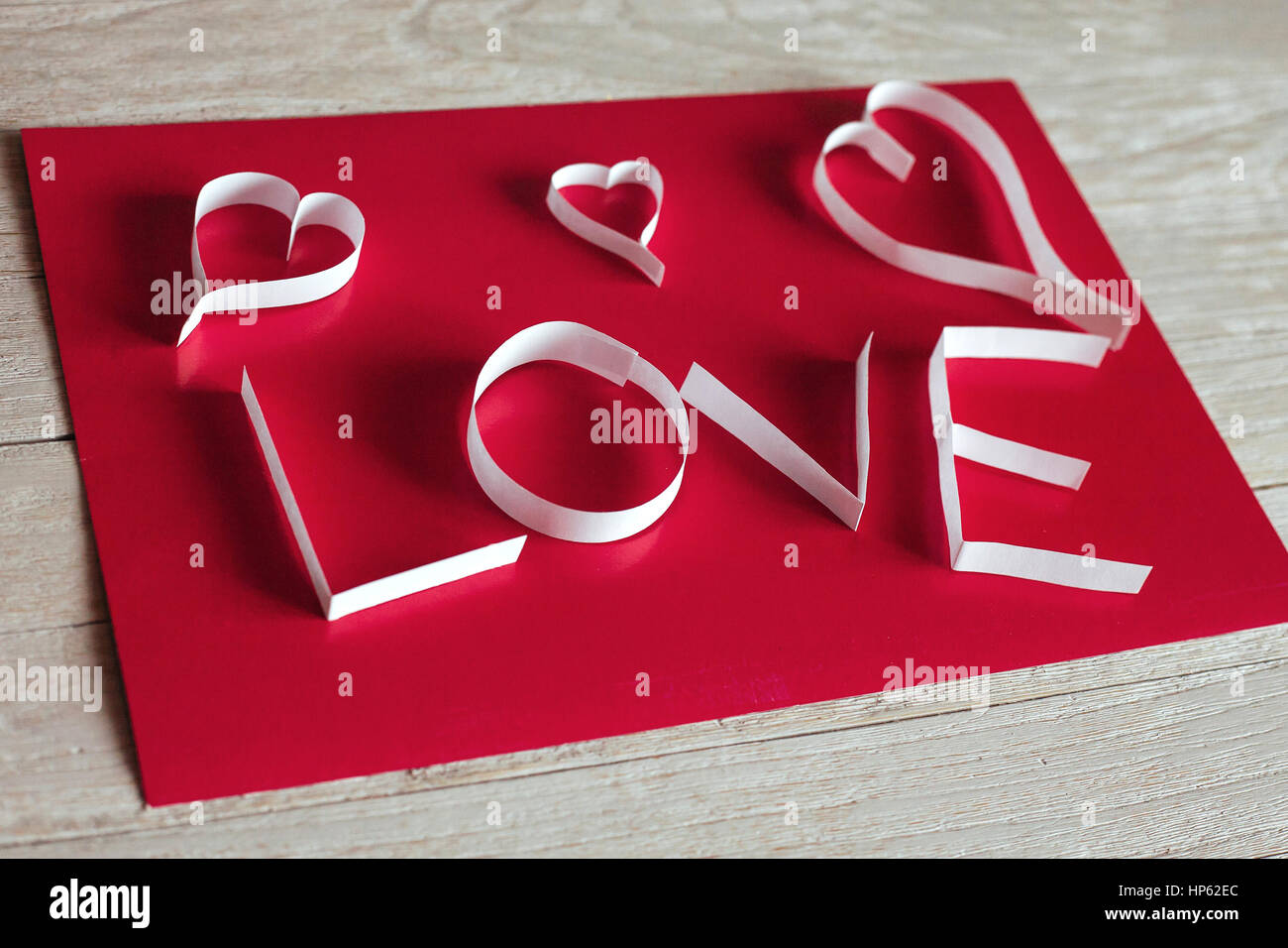 Valentine's day abstract background with cut paper heart Stock Photo ...