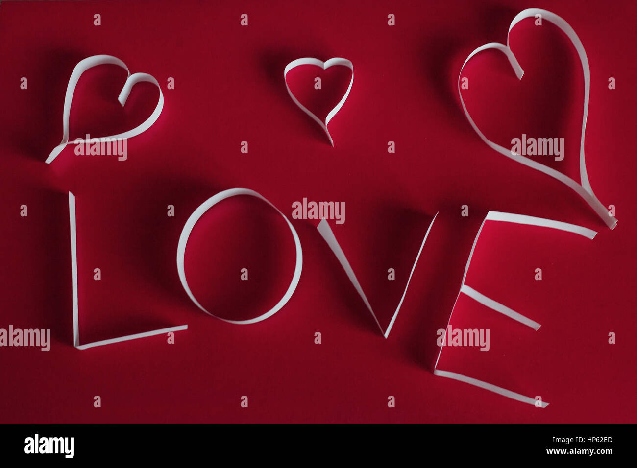 Valentine's day abstract background with cut paper heart Stock Photo ...