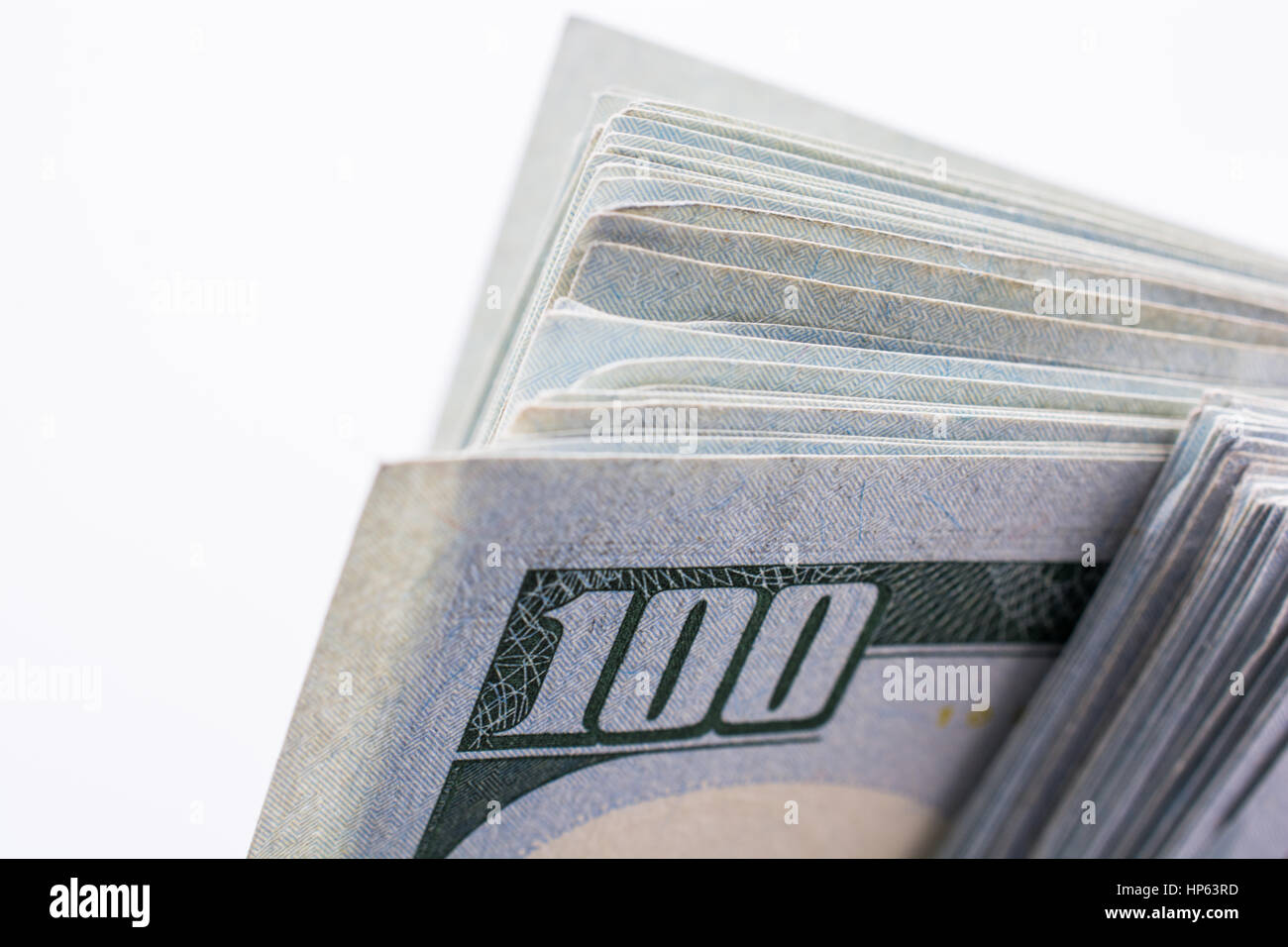 American 100 dollar banknotes made of paper placed on white background ...