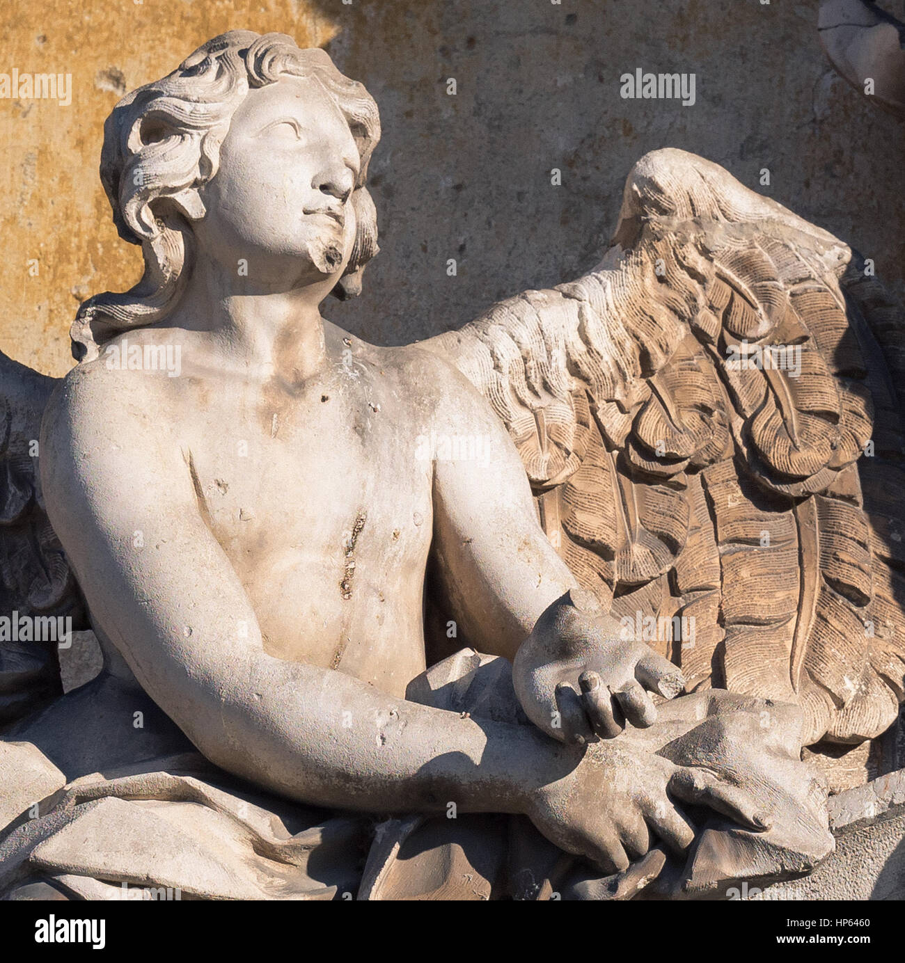 Detail of a stone angel on the facade of a medieval church Stock Photo ...