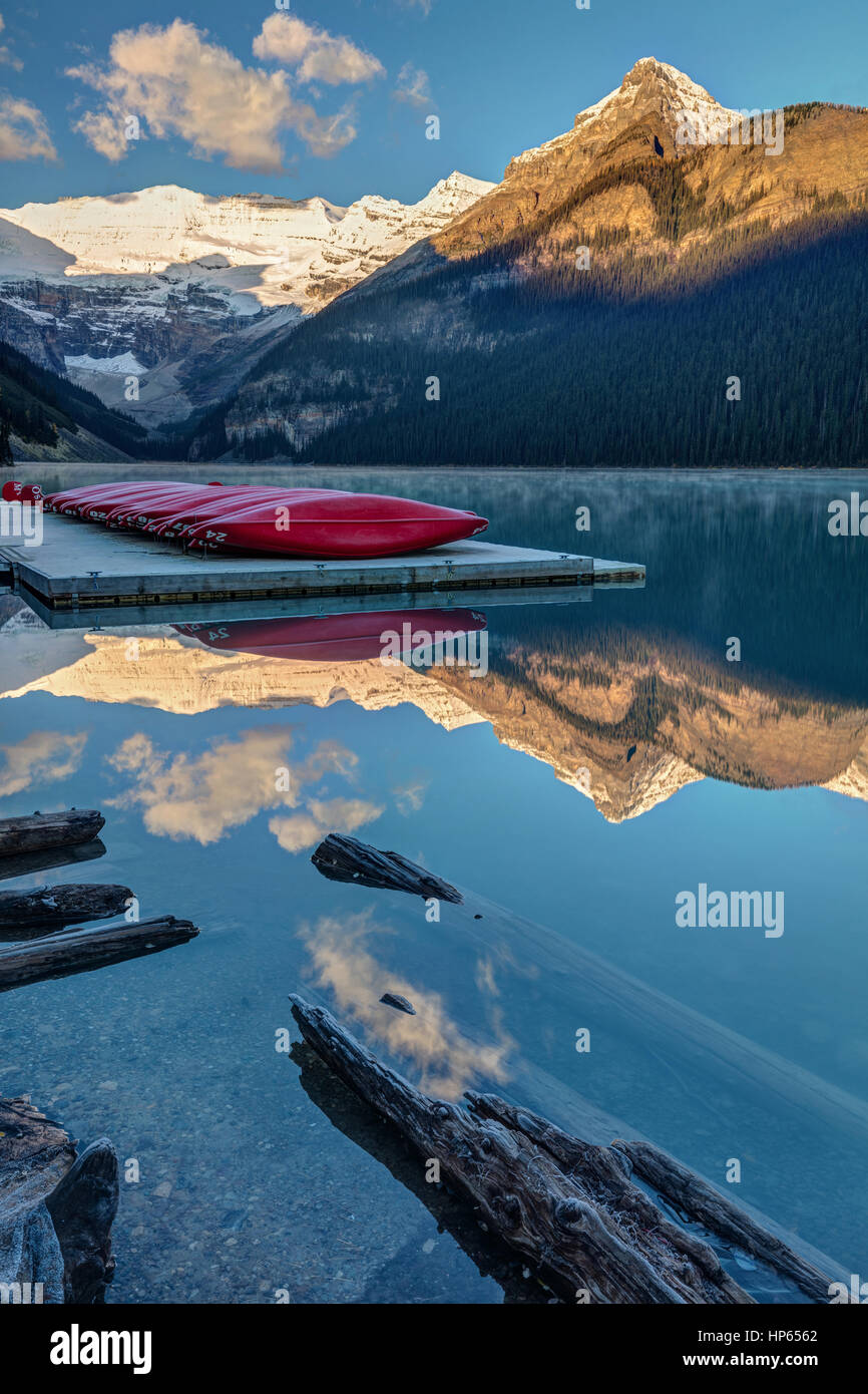 Banff Dock Red canoes on the dock at lake Louise in Banff National Park, Alberta ...
