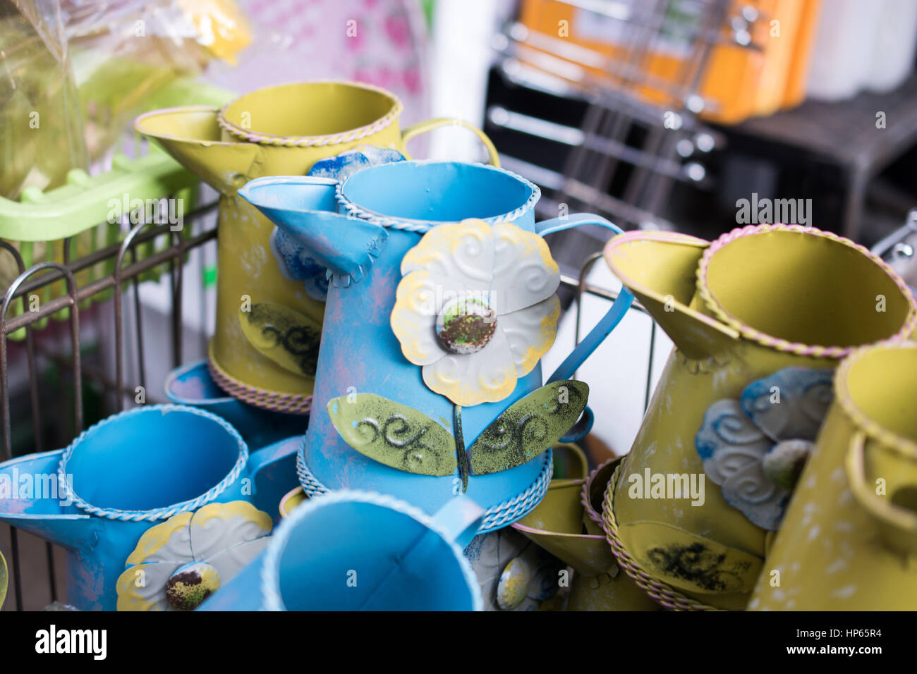 Set of colorful watering cans made of metal Stock Photo Alamy