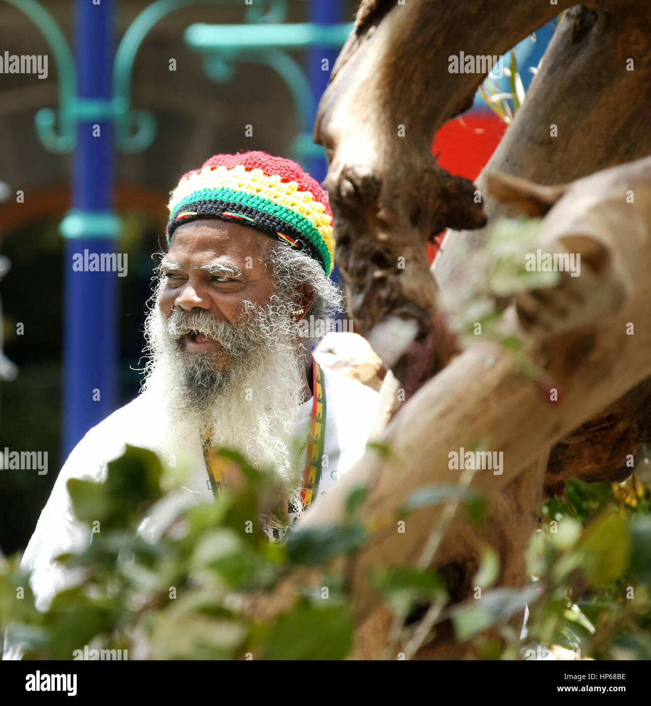 Caudan waterfront in the port of the capital Port Louis, wood artist, wood carver at the harbor