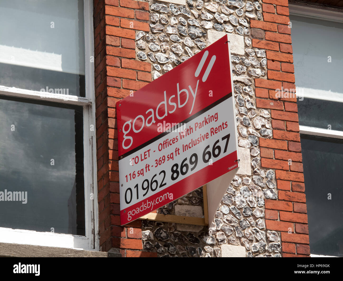 Commercial offices above retail premises to let sign Stock Photo Alamy