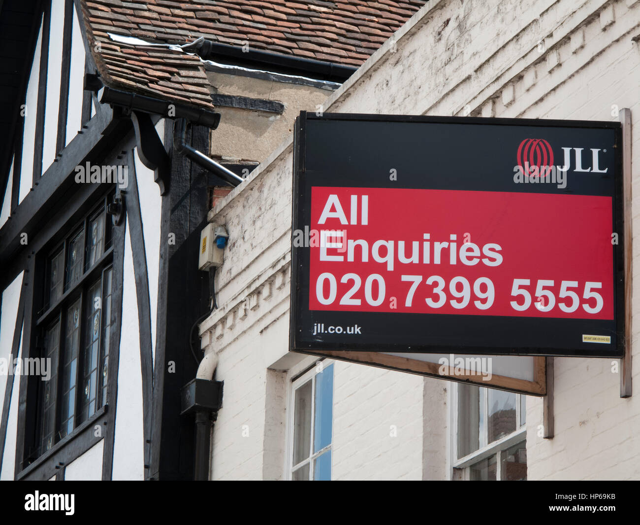 Commercial offices above retail premises to let sign Stock Photo Alamy