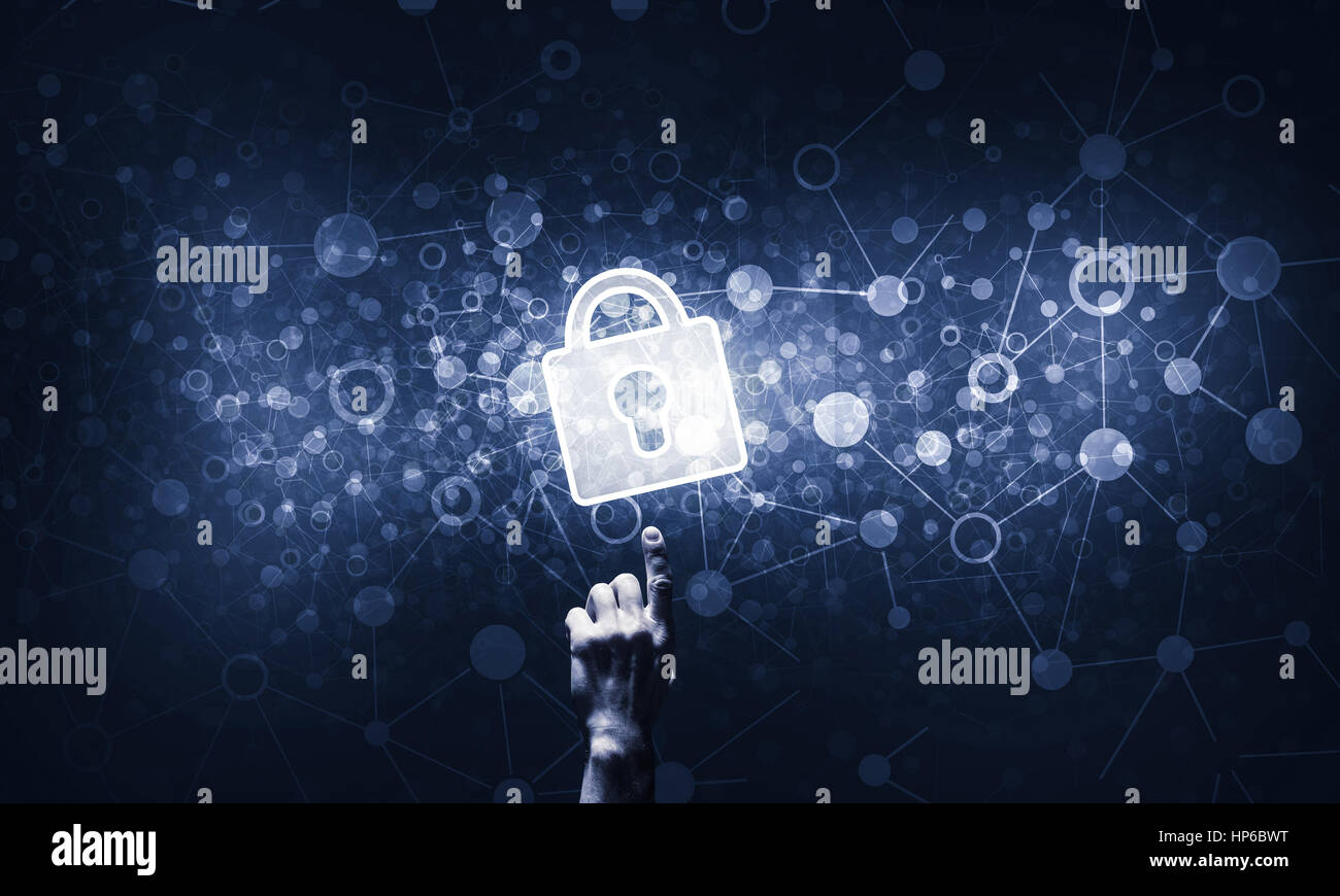 Lock glowing icon pressed with finger on dark background Stock Photo ...
