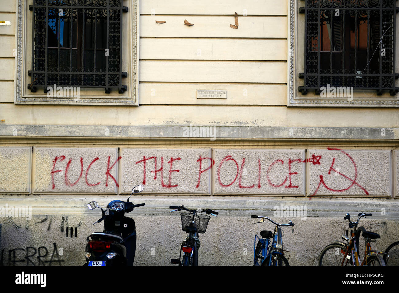 graffiti, vandalism, anarchy, anarchism, anarchist, anarchists, sign, spray paint, slogan, fuck the police, antisocial behaviour, Pisa, Italy, RM Worl Stock Photo