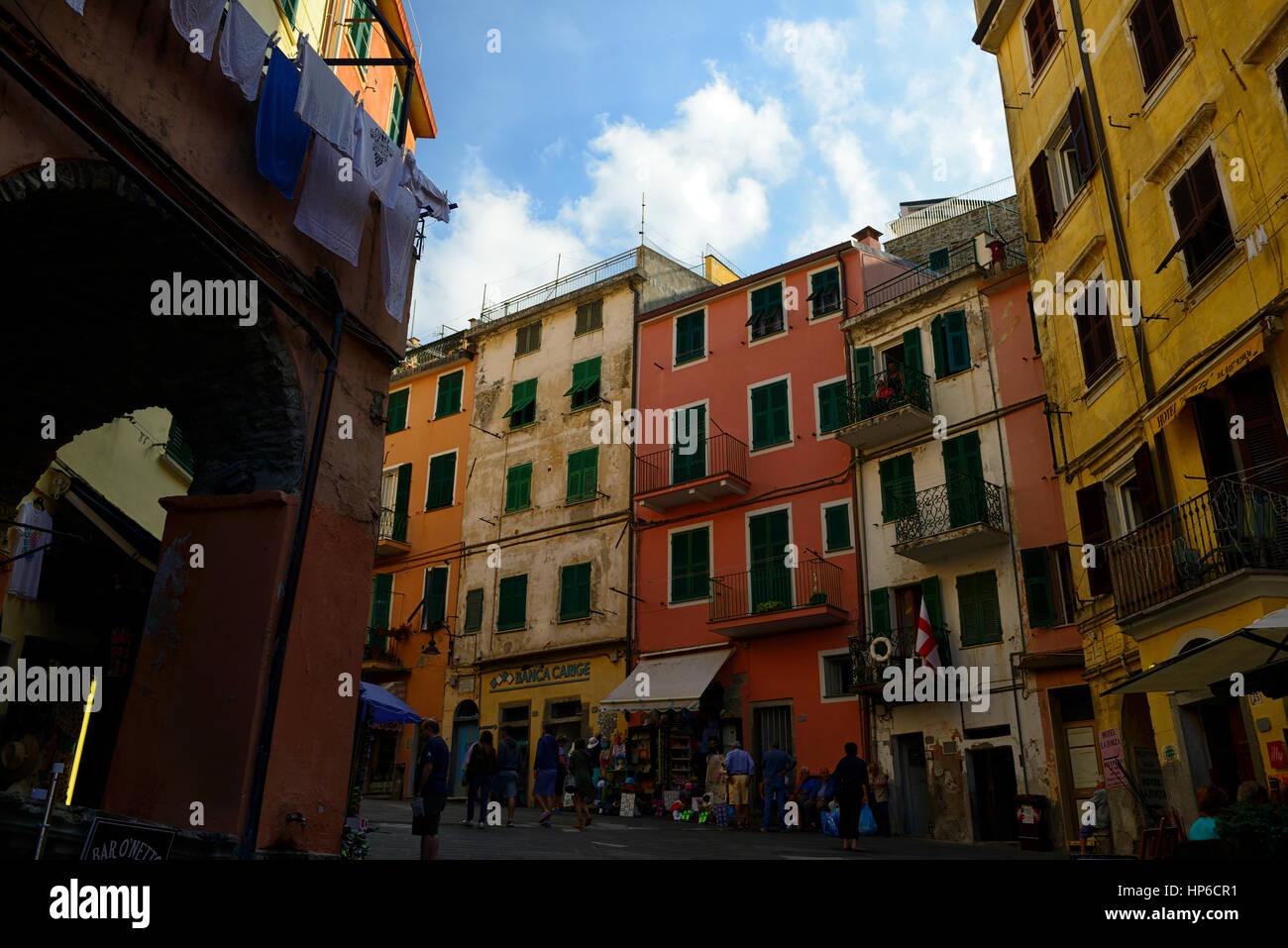 colourful, colorful, houses, shops, buildings, premises, tourists, tourist attraction, Clifftop village, Riomaggiore, Cinque Terre, UNESCO World Herit Stock Photo