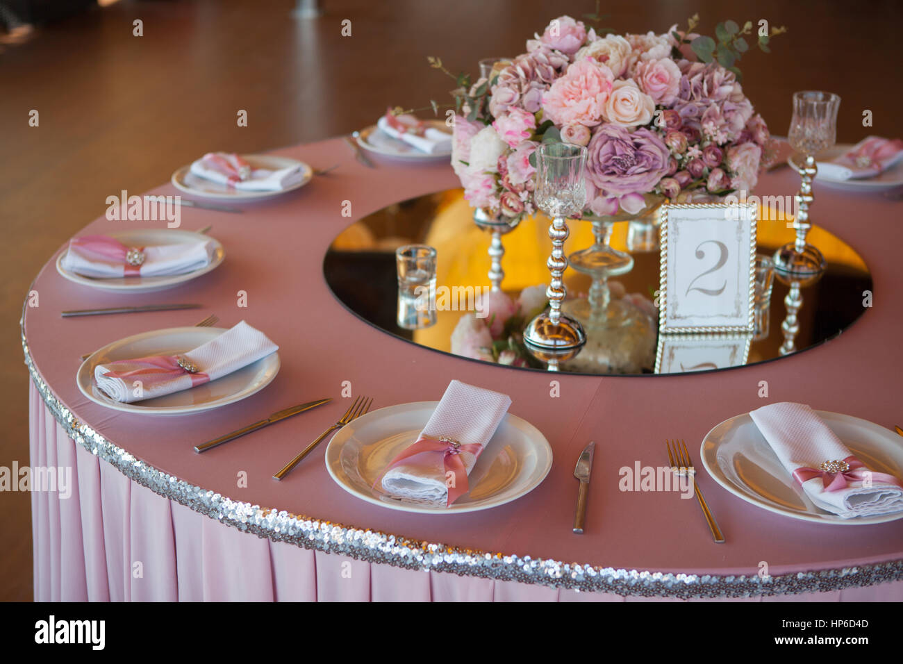 Table appointments in restaurant. Pink wedding preparation Stock Photo