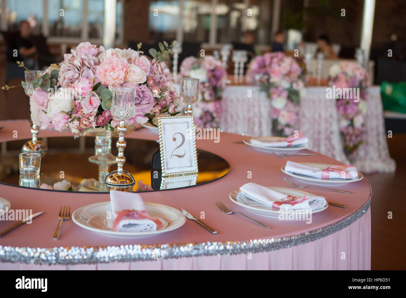 Table appointments in restaurant. Pink wedding preparation Stock Photo
