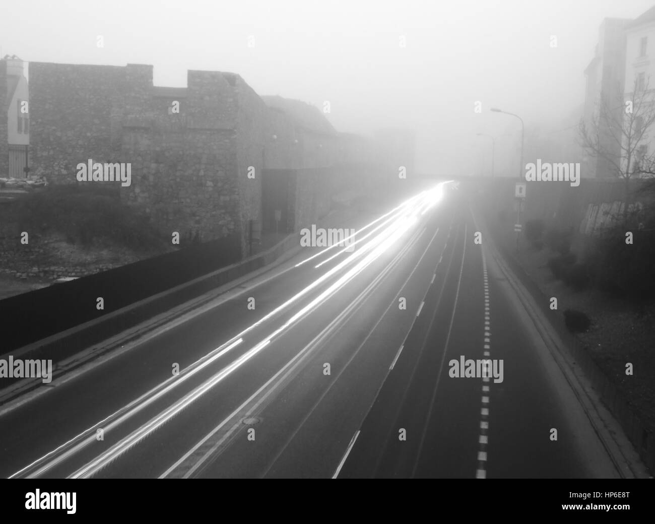 Morning fog in city road and cars Stock Photo - Alamy