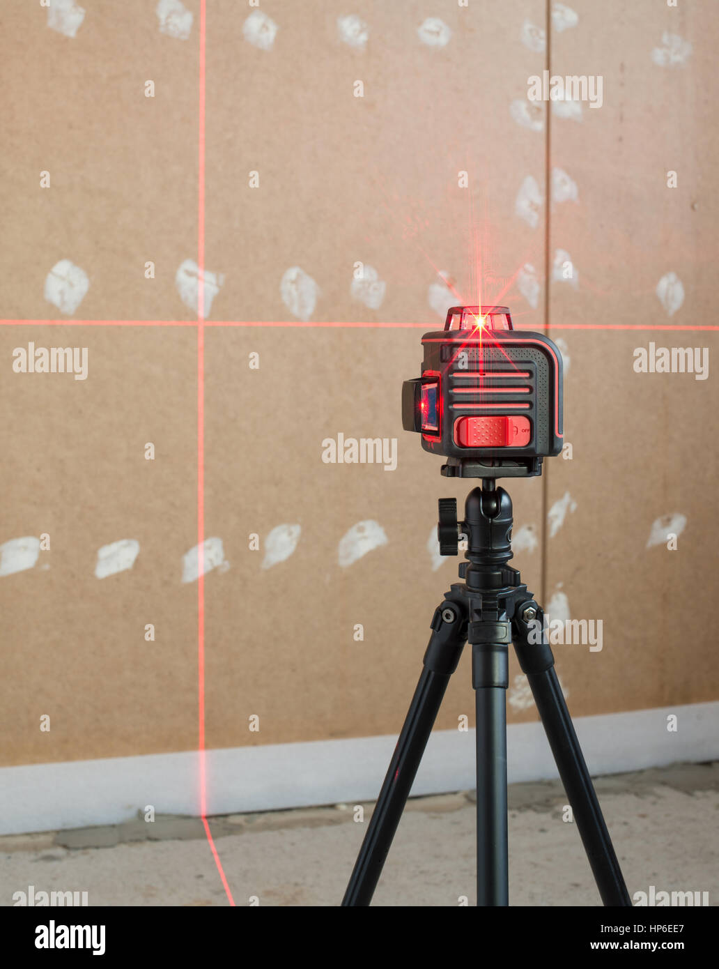Laser level measuring tool in construction site Stock Photo - Alamy