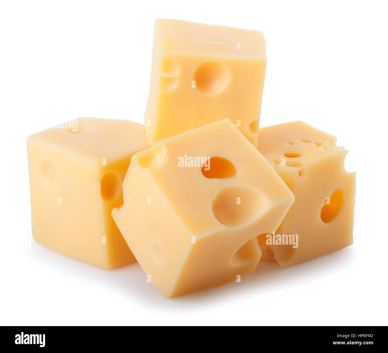 bits of cheese with big holes isolated on white background. Heap of maasdam pieces Stock Photo