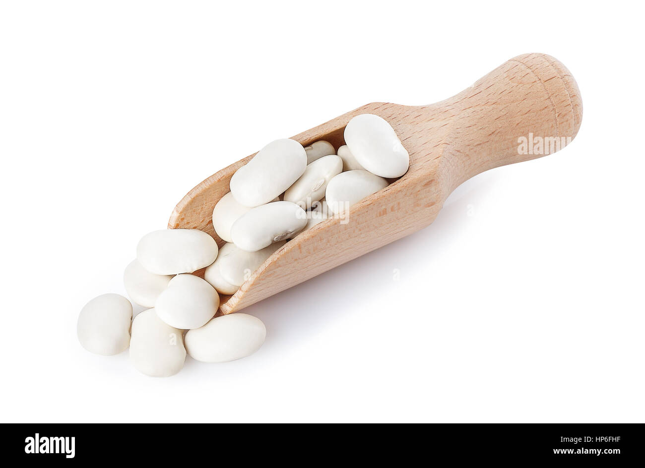 Butter beans or lima beans on wooden scoop isolated on white background